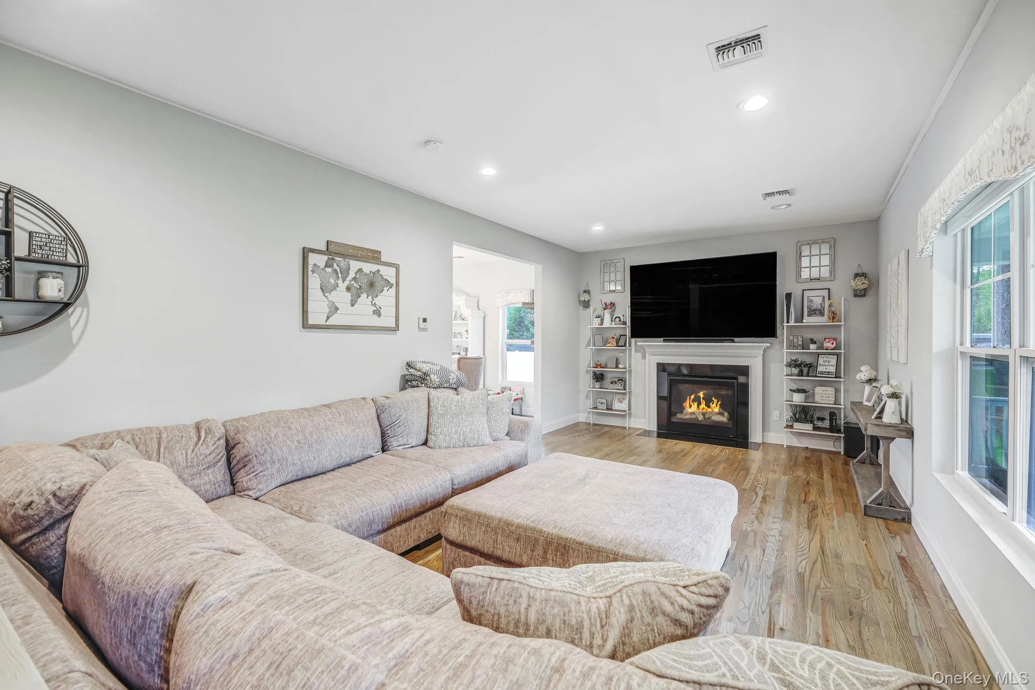 Spacious LR with HW Floors, Gas Fireplace, Recessed Lighting, Open Flow to EIK and Formal DR Spacious LR with HW Floors, Gas Fireplace, Recessed Lighting, Open Flow to EIK and Formal DR