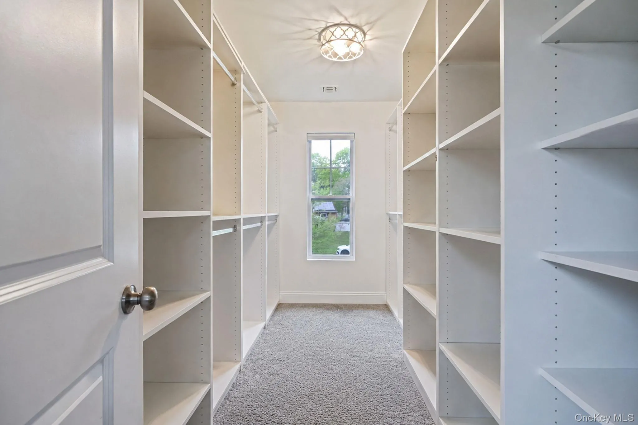 Primary En-Suite Walk In Closet, Custom Built Ins Primary En-Suite Walk In Closet, Custom Built Ins