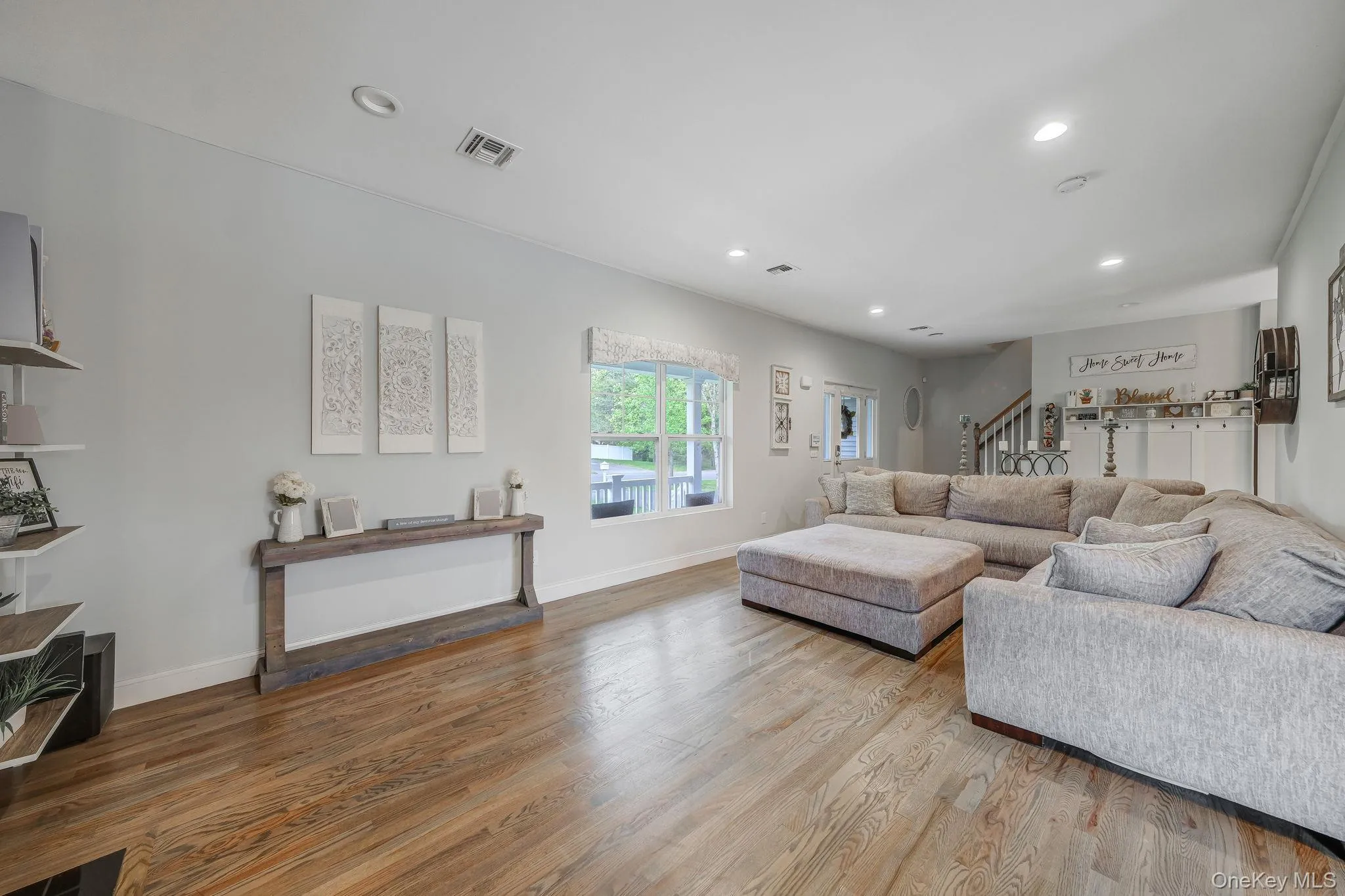 Spacious LR with HW Floors, Gas Fireplace, Recessed Lighting, Open Flow to EIK and Formal DR Spacious LR with HW Floors, Gas Fireplace, Recessed Lighting, Open Flow to EIK and Formal DR