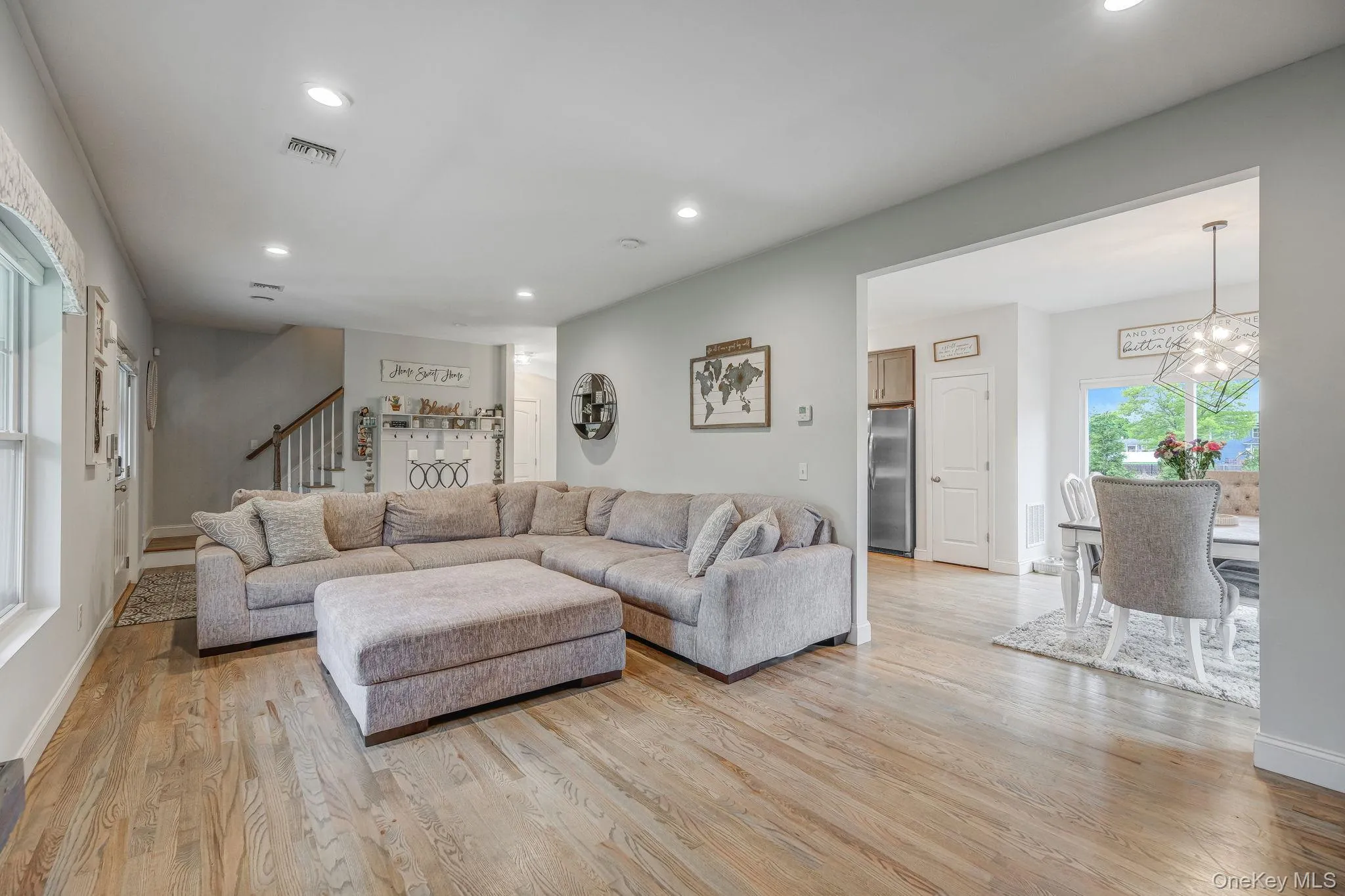 Spacious LR with HW Floors, Gas Fireplace, Recessed Lighting, Open Flow to EIK and Formal DR Spacious LR with HW Floors, Gas Fireplace, Recessed Lighting, Open Flow to EIK and Formal DR
