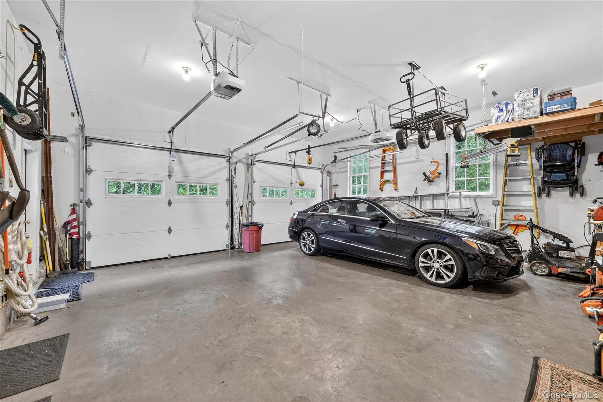 Garage featuring a garage door opener Garage featuring a garage door opener