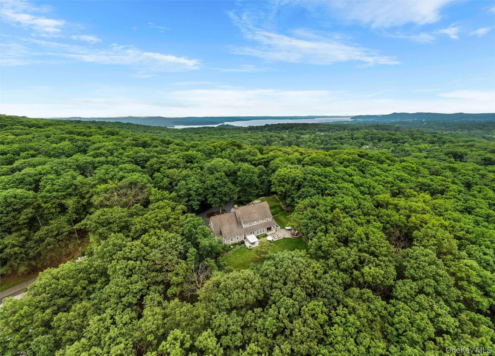 View from above of property featuring a forest View from above of property featuring a forest