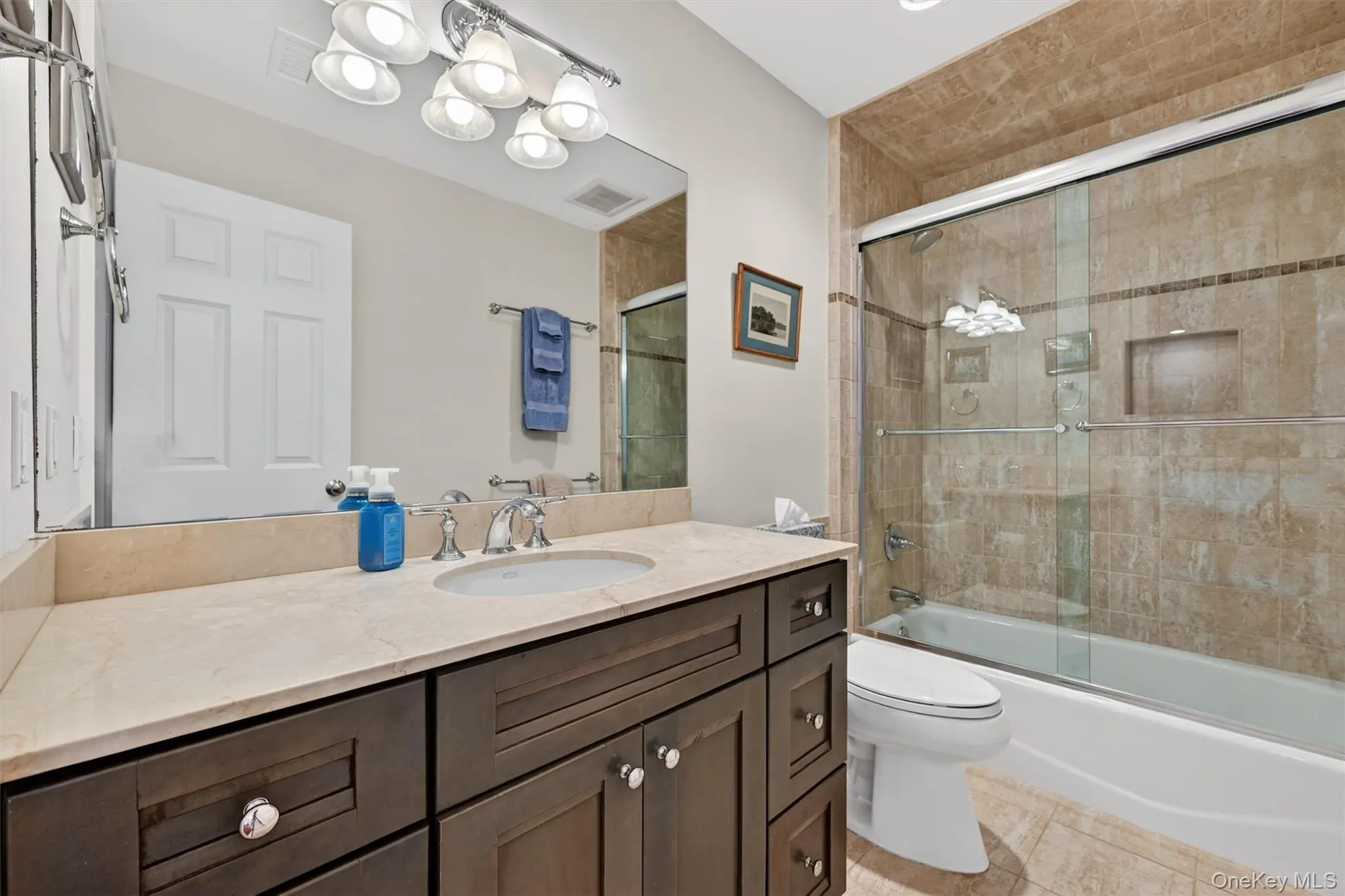 A well-appointed full bathroom on the second floor featuring a large vanity and a tub/shower combination for everyday comfort and convenience. A well-appointed full bathroom on the second floor featuring a large vanity and a tub/shower combination for everyday comfort and convenience.