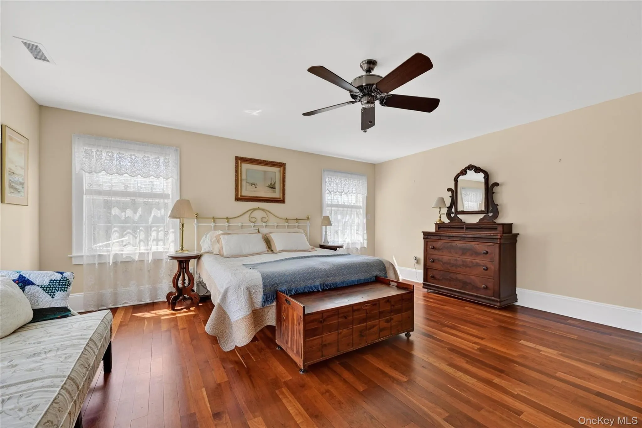 The primary bedroom is a spacious and serene retreat, filled with natural light and offering plenty of room to relax and unwind. The primary bedroom is a spacious and serene retreat, filled with natural light and offering plenty of room to relax and unwind.