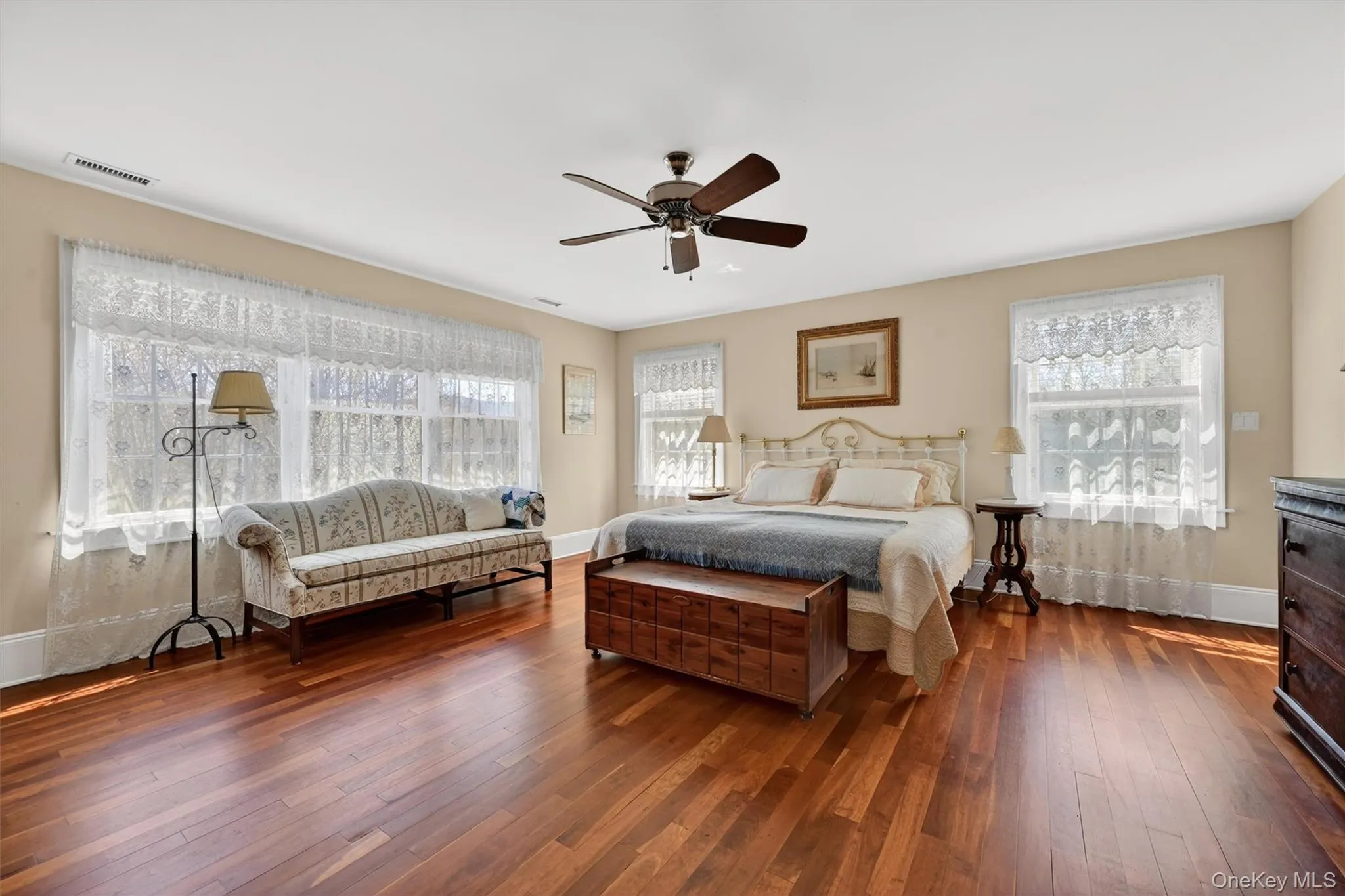 The primary suite offers a spacious and serene retreat, complete with abundant natural light and plenty of room to relax and unwind. The primary suite offers a spacious and serene retreat, complete with abundant natural light and plenty of room to relax and unwind.