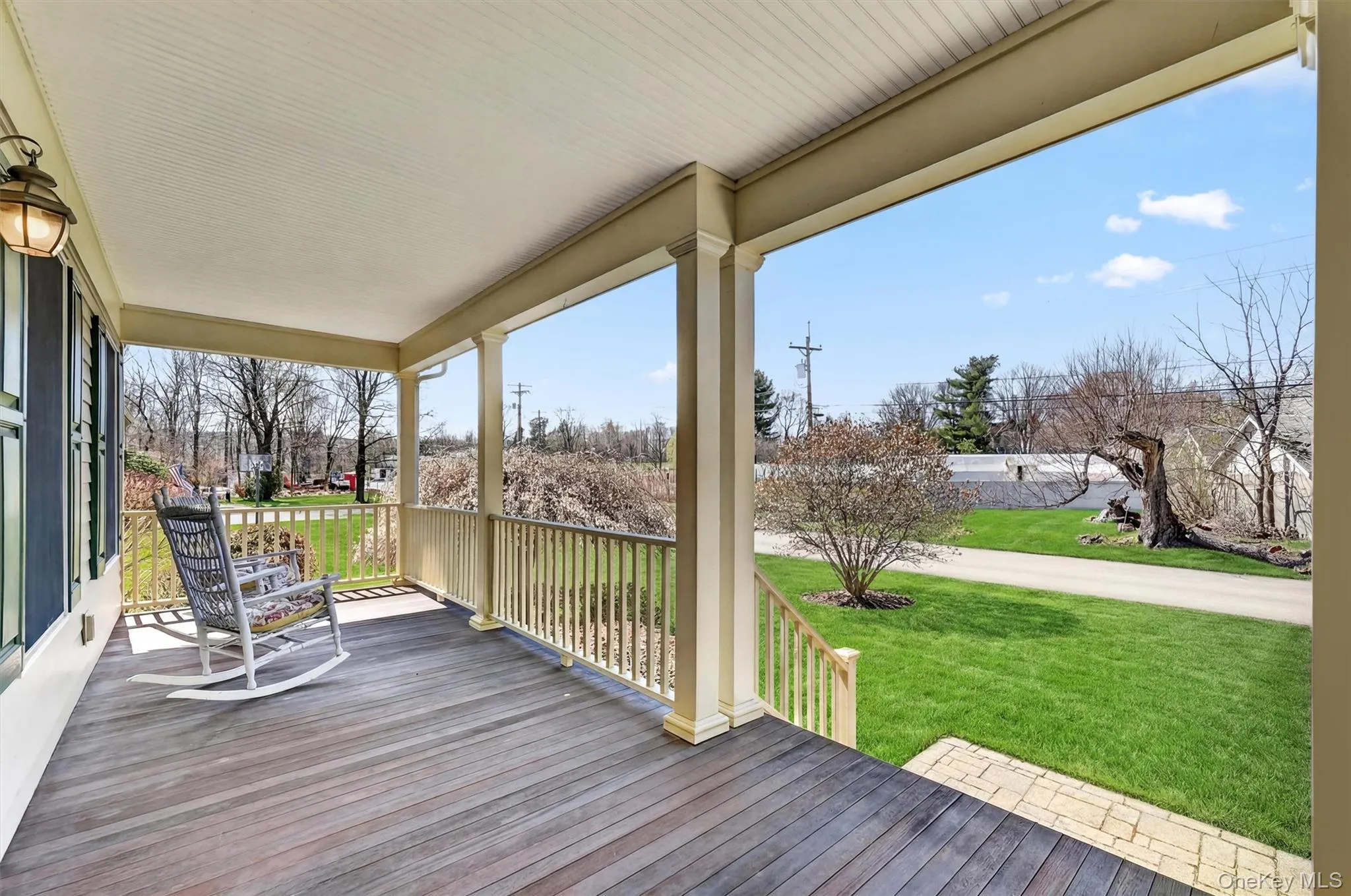 The covered rocking chair porch creates a warm and inviting first impression, welcoming guests with charm and a sense of home. The covered rocking chair porch creates a warm and inviting first impression, welcoming guests with charm and a sense of home.