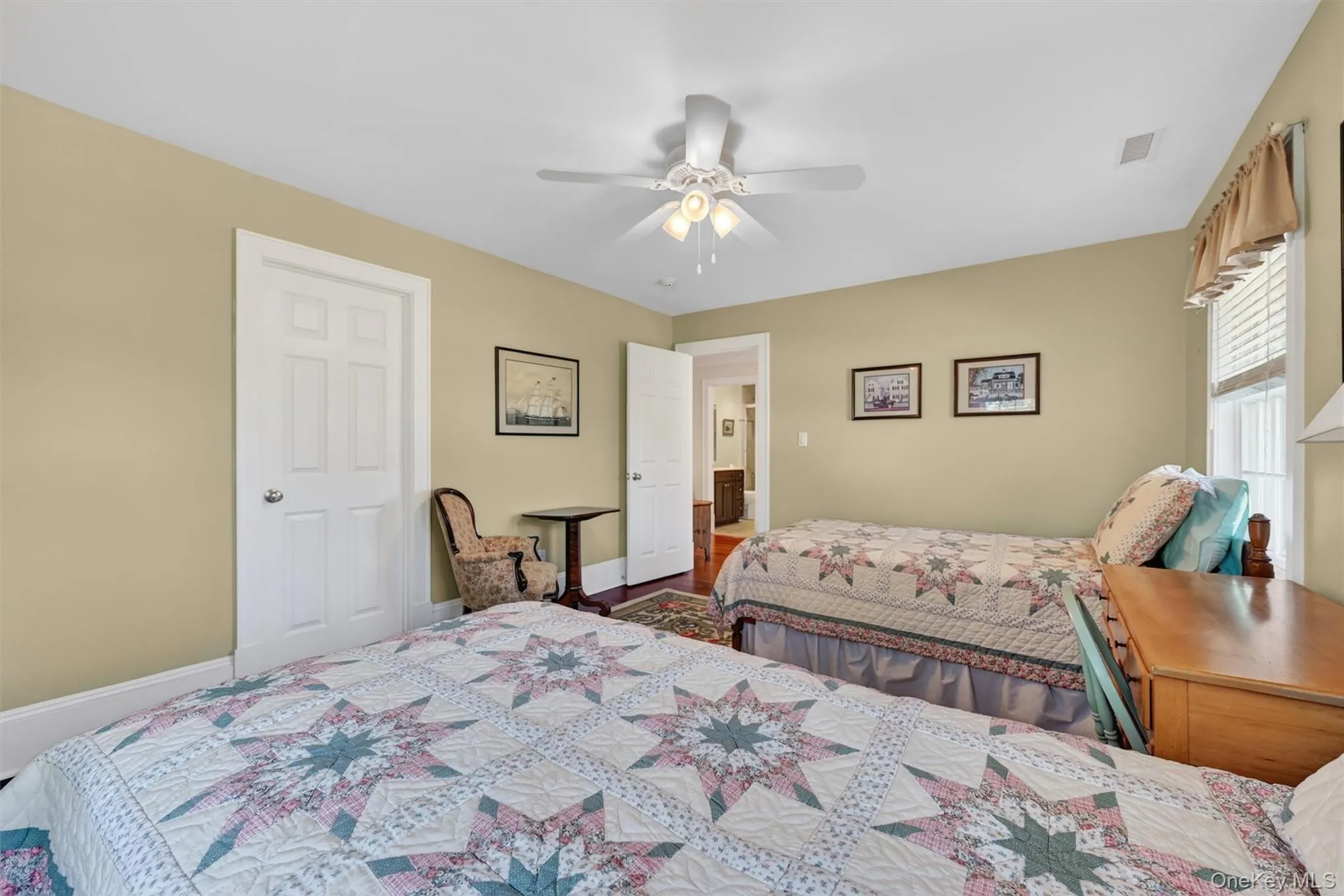 Another view of the spacious third bedroom with room for two beds, offering flexibility for guests, shared living, or additional sleeping arrangements. Another view of the spacious third bedroom with room for two beds, offering flexibility for guests, shared living, or additional sleeping arrangements.