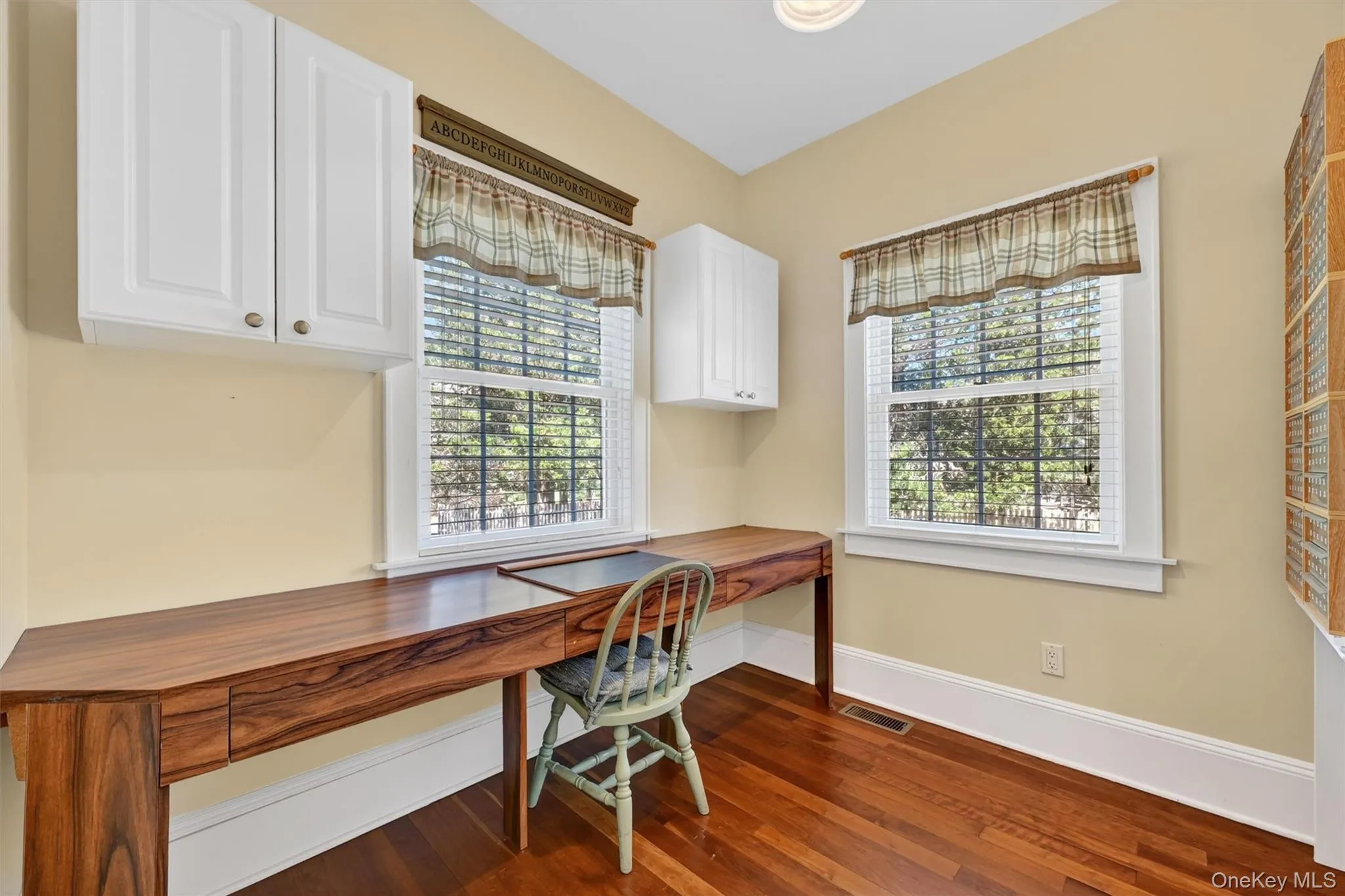 This charming and sunlit home office is on the main level (just off of the butler's pantry and laundry room) offers a quiet and comfortable space for work, reading, or managing daily tasks. This space completes the main level. This charming and sunlit home office is on the main level (just off of the butler's pantry and laundry room) offers a quiet and comfortable space for work, reading, or managing daily tasks. This space completes the main level.