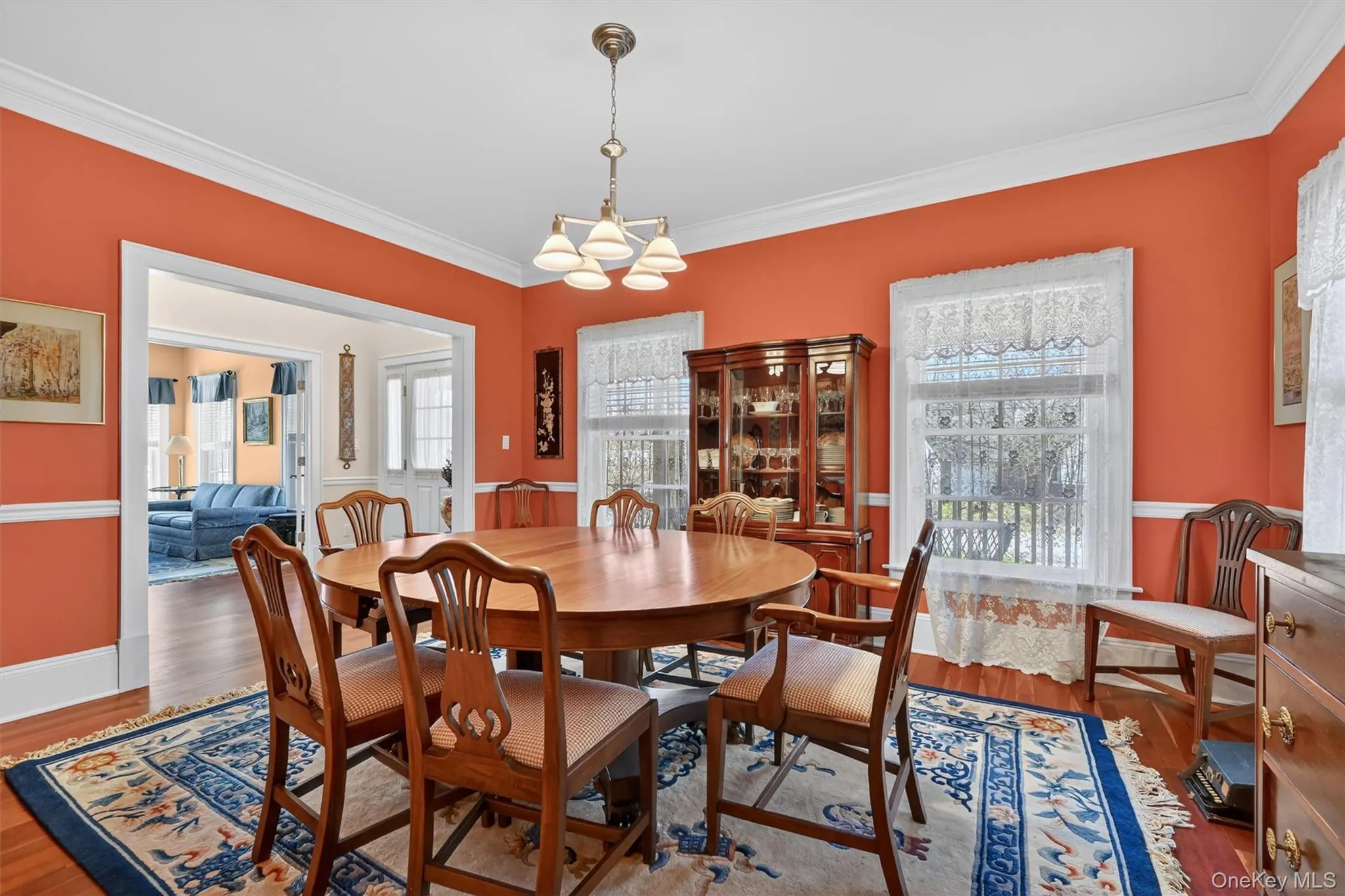 The formal dining room is both elegant and welcoming, featuring warm tones, detailed trim, and the perfect setting for hosting gatherings or holiday meals. The formal dining room is both elegant and welcoming, featuring warm tones, detailed trim, and the perfect setting for hosting gatherings or holiday meals.