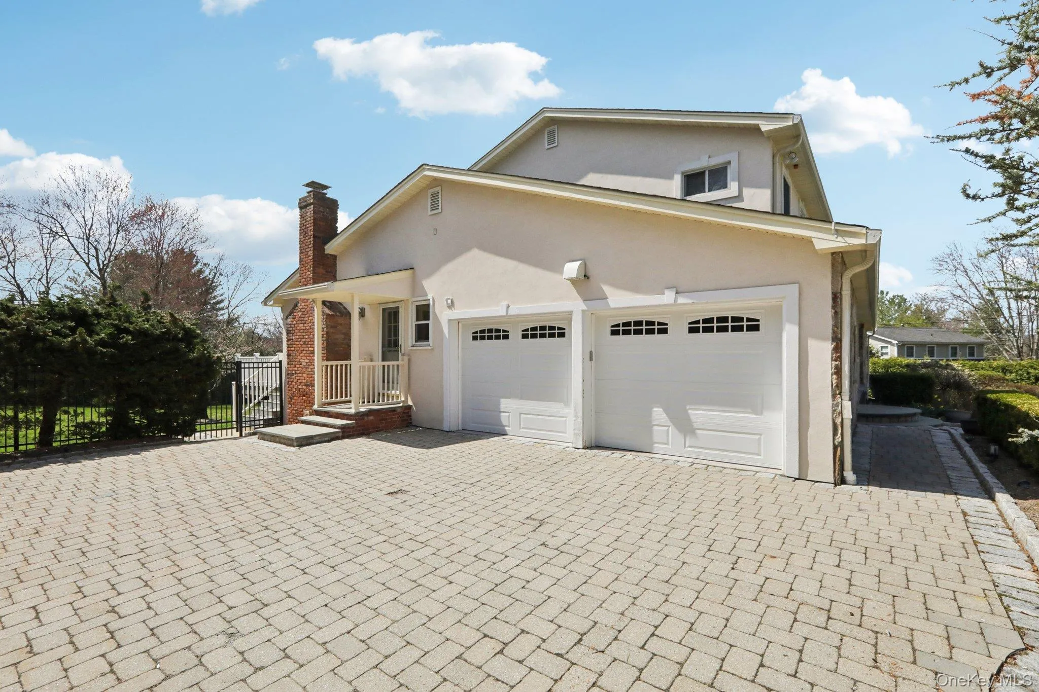 Paver driveway with entry into mudroom and W/D Paver driveway with entry into mudroom and W/D