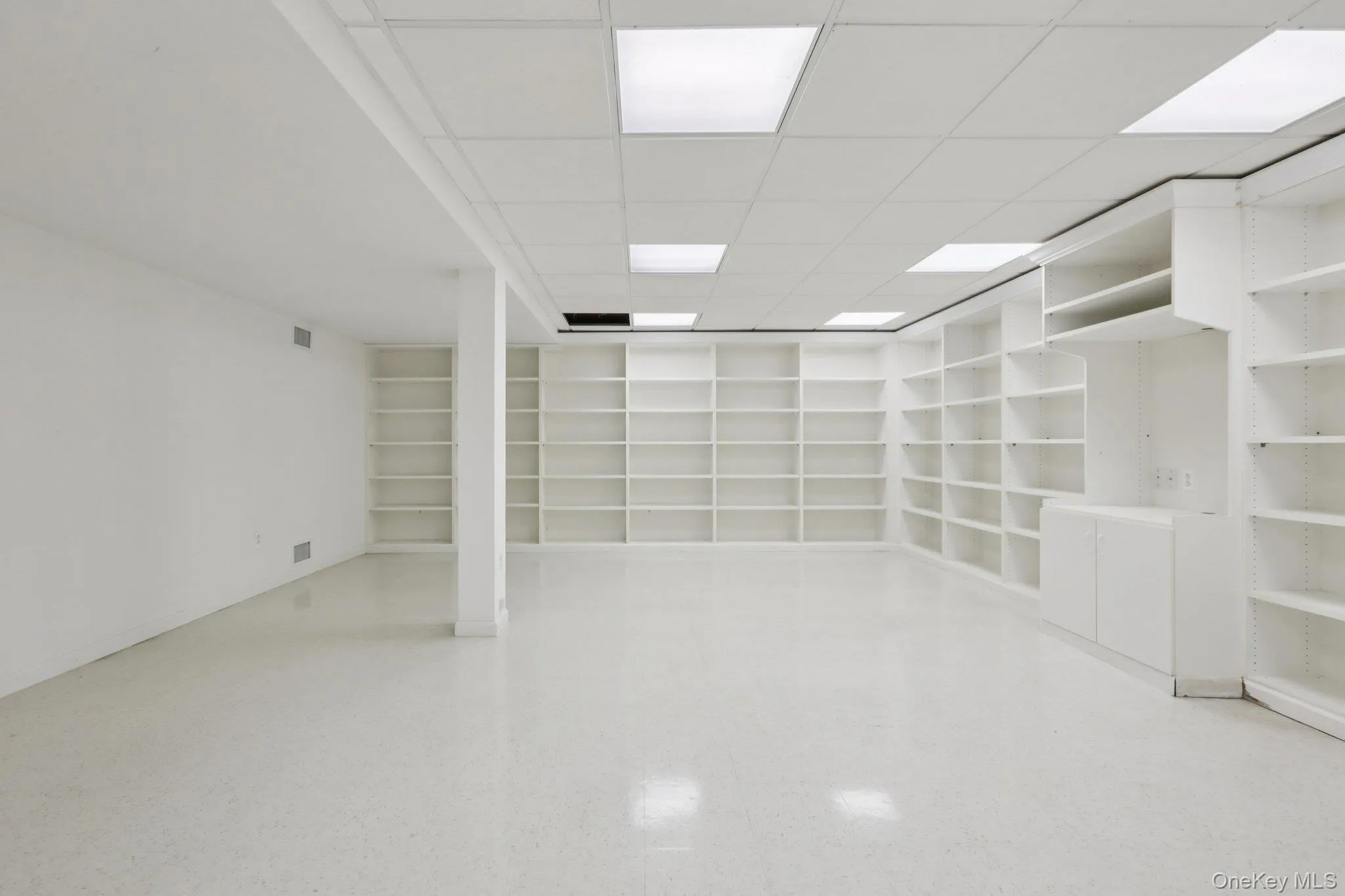 Huge finished basement with built in shelving Perfect for in home business or In law suite. Huge finished basement with built in shelving Perfect for in home business or In law suite.