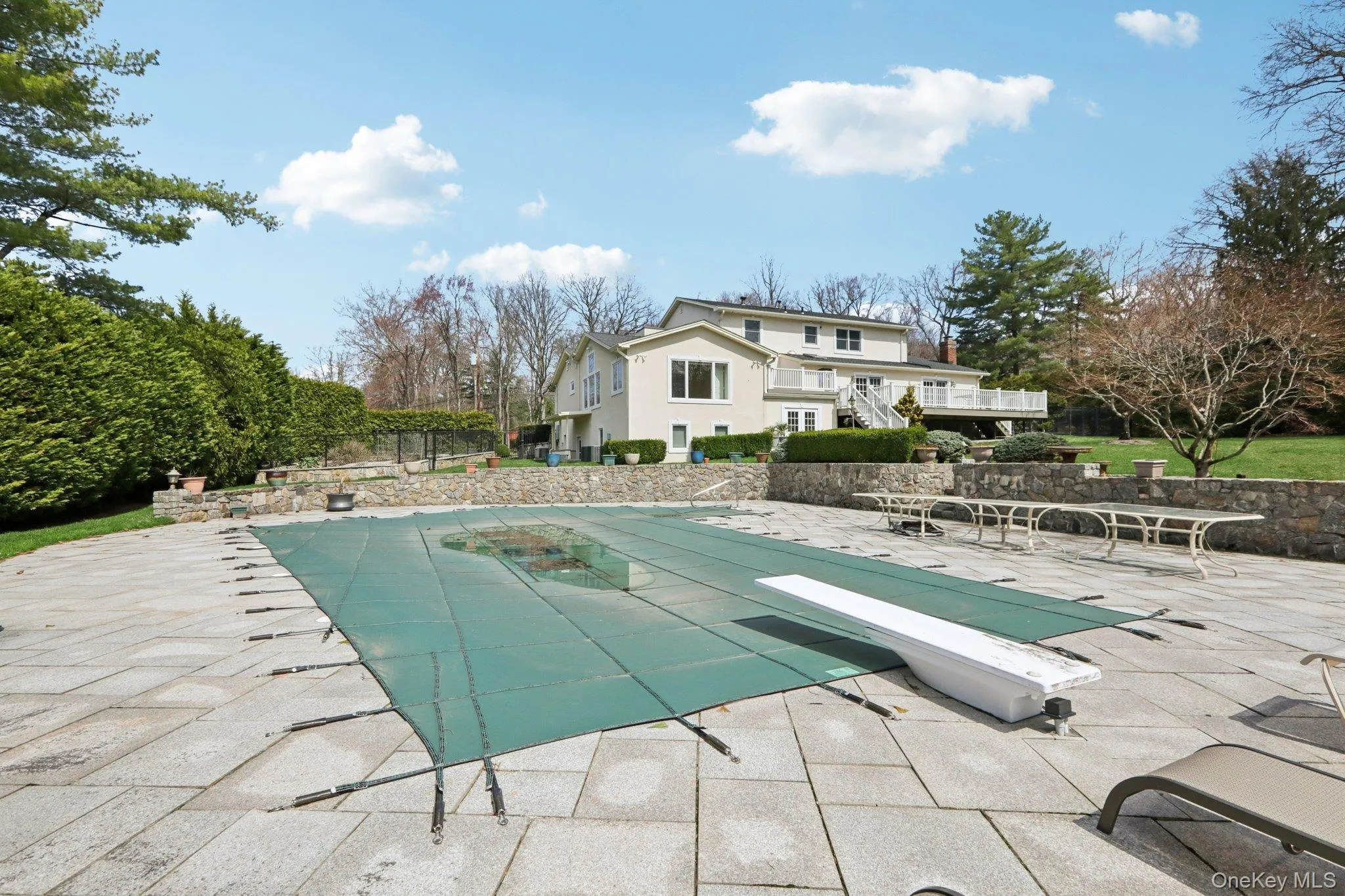 Heated salt water pool with rough marble surround Heated salt water pool with rough marble surround
