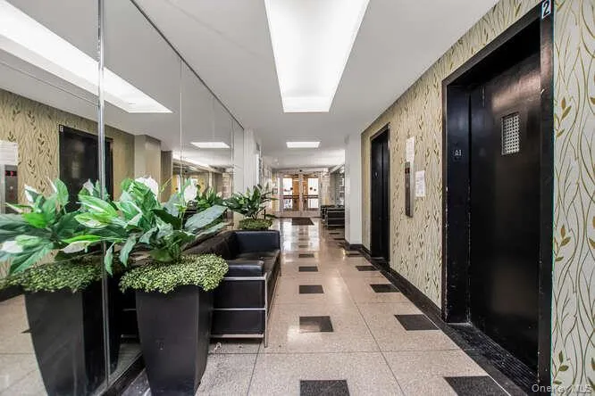 Building lobby with wallpapered walls Building lobby with wallpapered walls