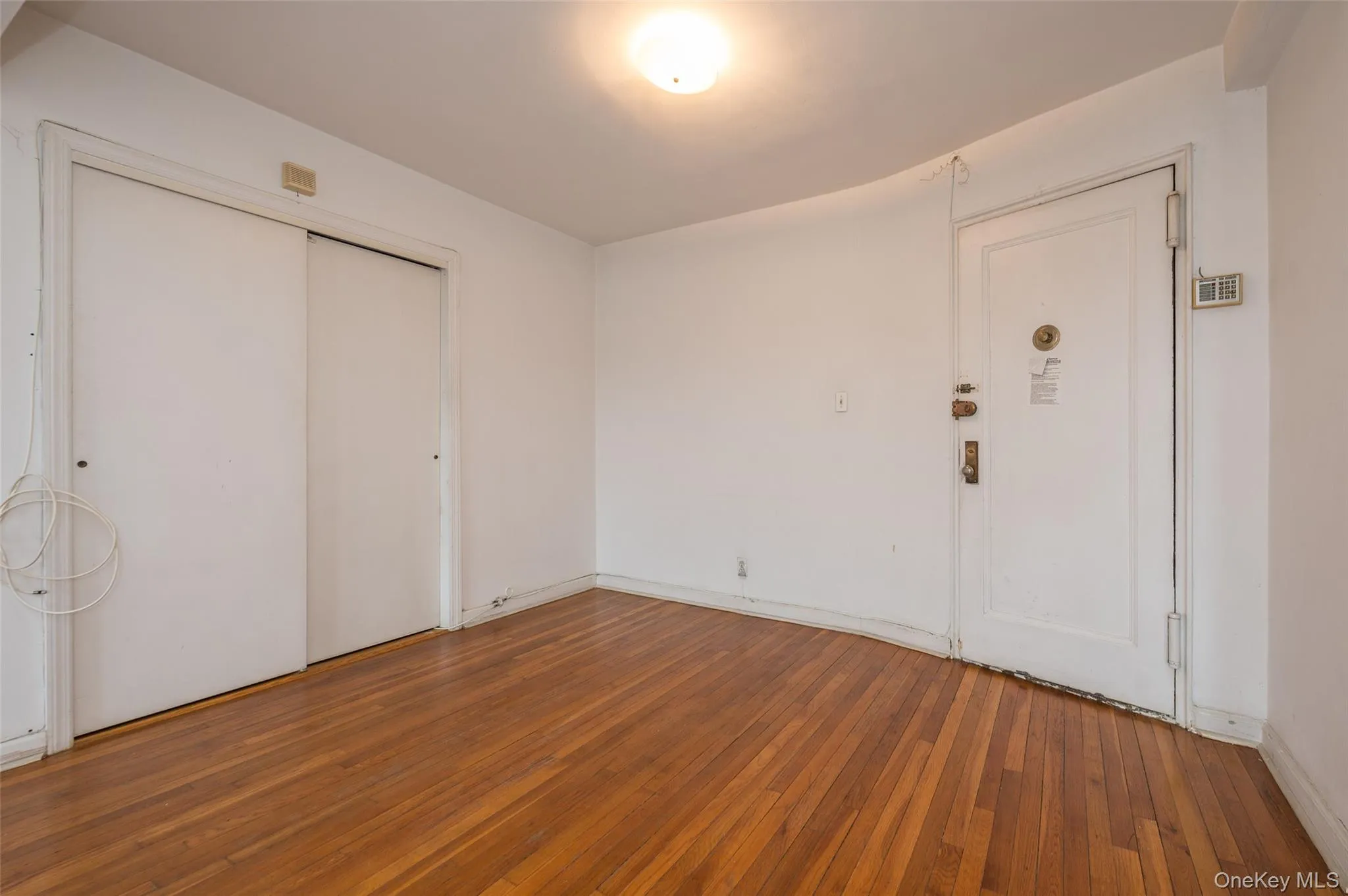 Entrance foyer with hardwood / wood-style flooring Entrance foyer with hardwood / wood-style flooring