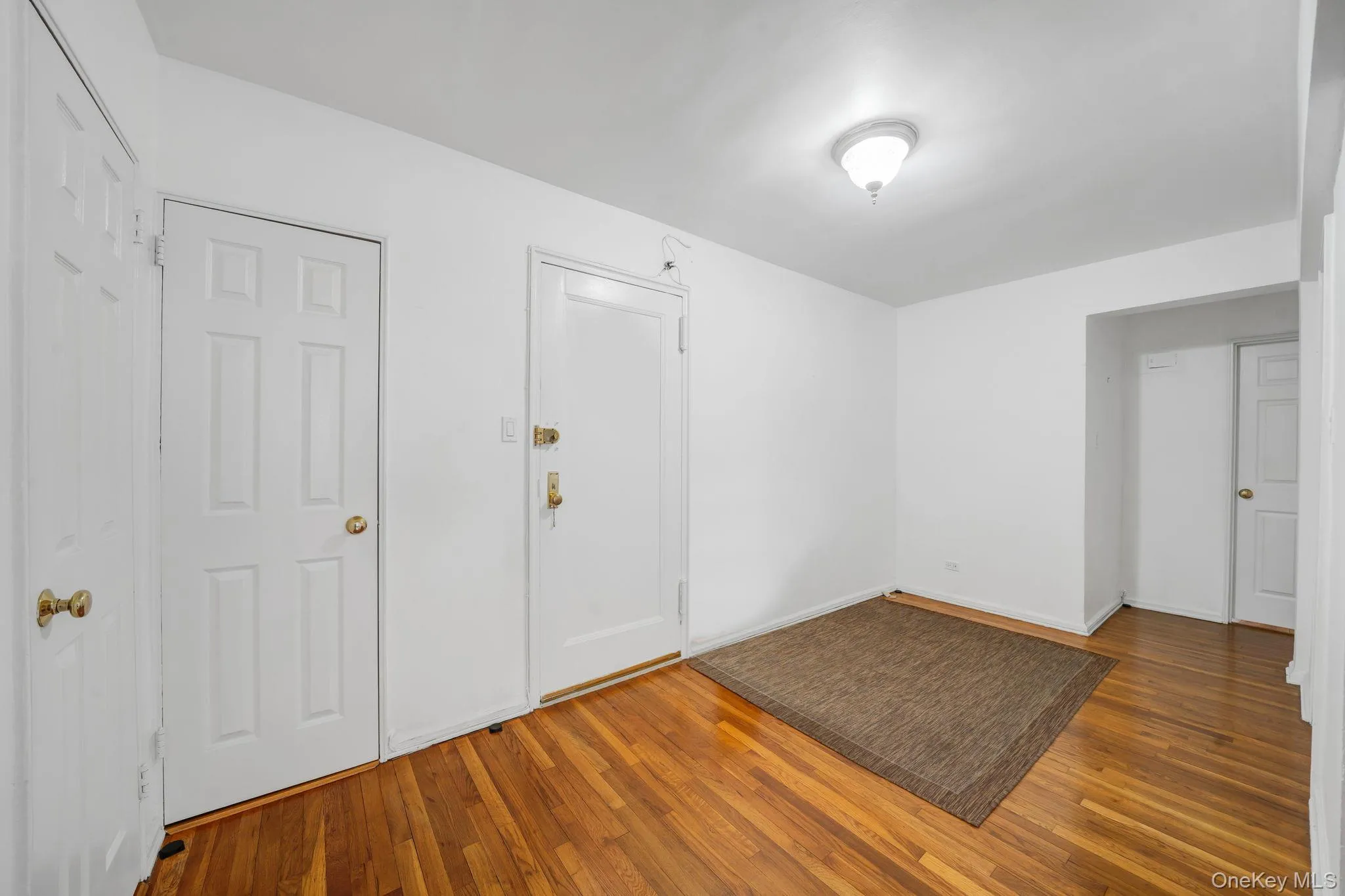 Entry/Dining Area with HW Floors, 3 Spacious Closets Entry/Dining Area with HW Floors, 3 Spacious Closets