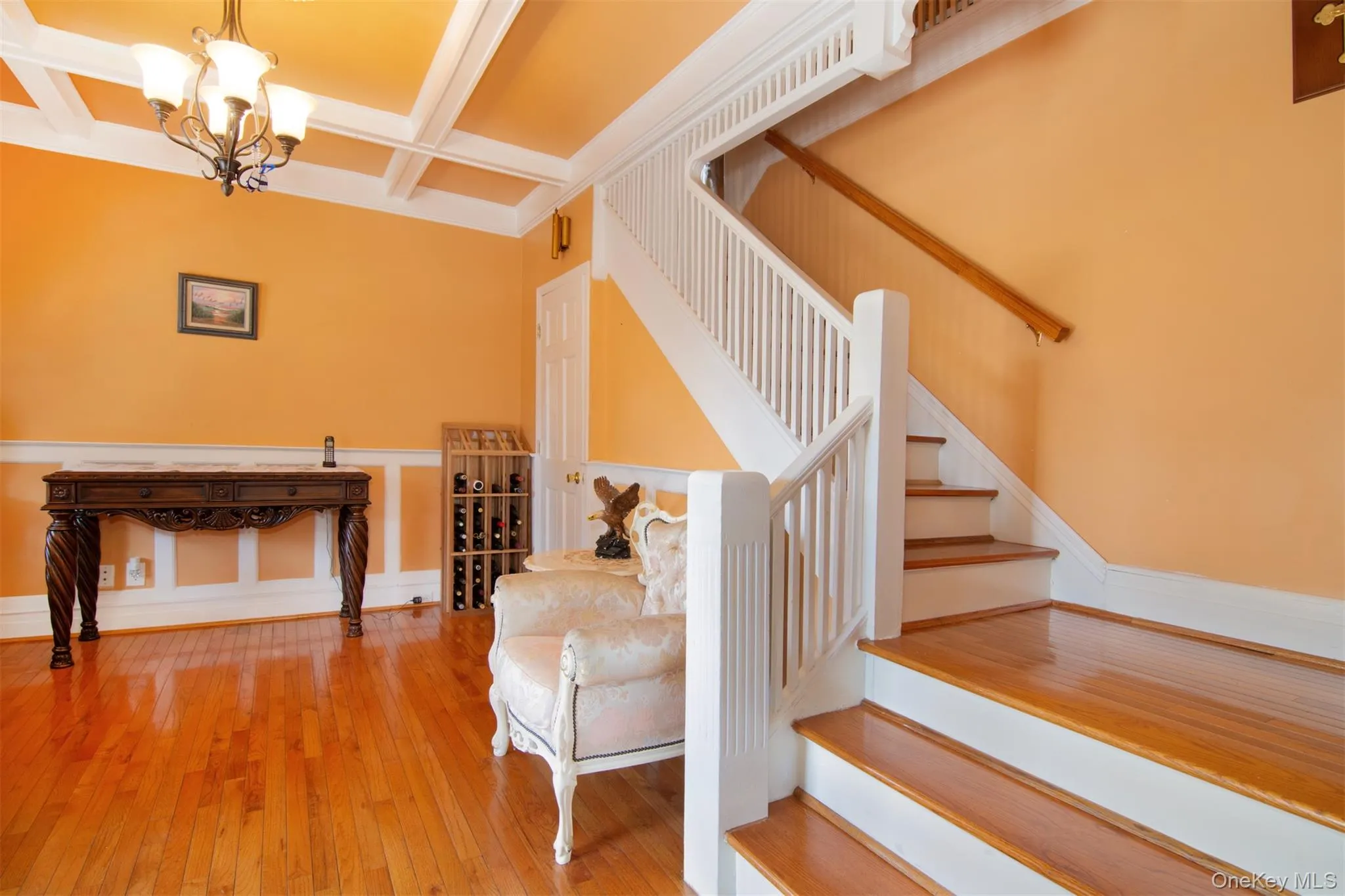 A grand original stair case with a unique design graces the foyer A grand original stair case with a unique design graces the foyer