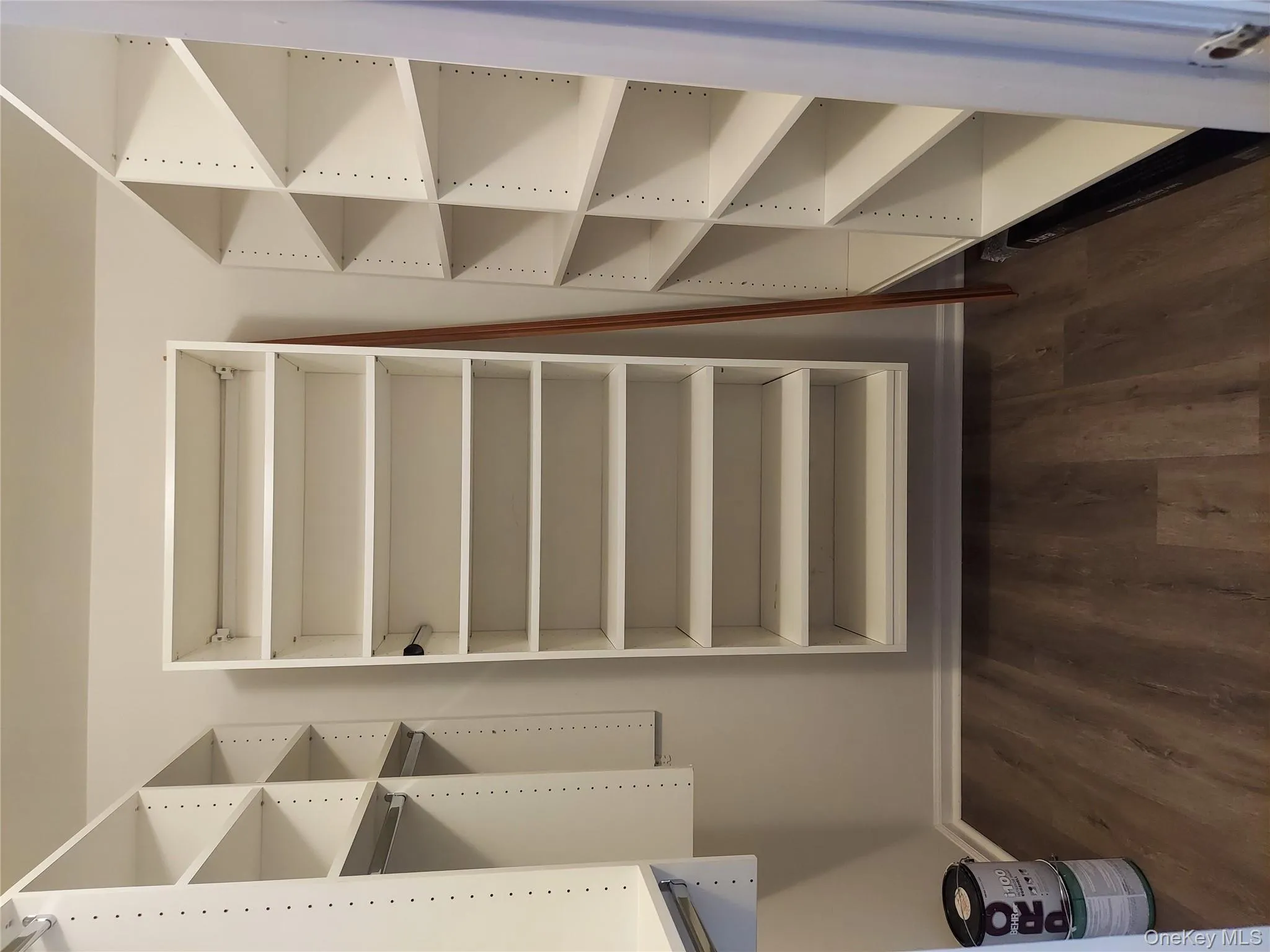 Walk in closet off of living room. New flooring and freshly painted Walk in closet off of living room. New flooring and freshly painted