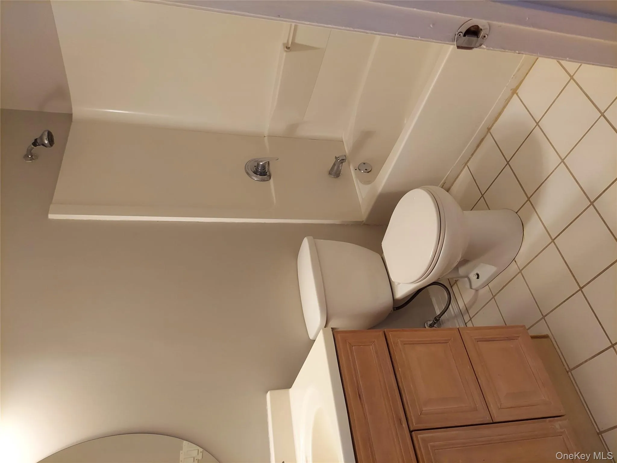 Full bathroom featuring shower / bathtub combination, toilet, vanity, and tile patterned floors. Freshly painted Full bathroom featuring shower / bathtub combination, toilet, vanity, and tile patterned floors. Freshly painted