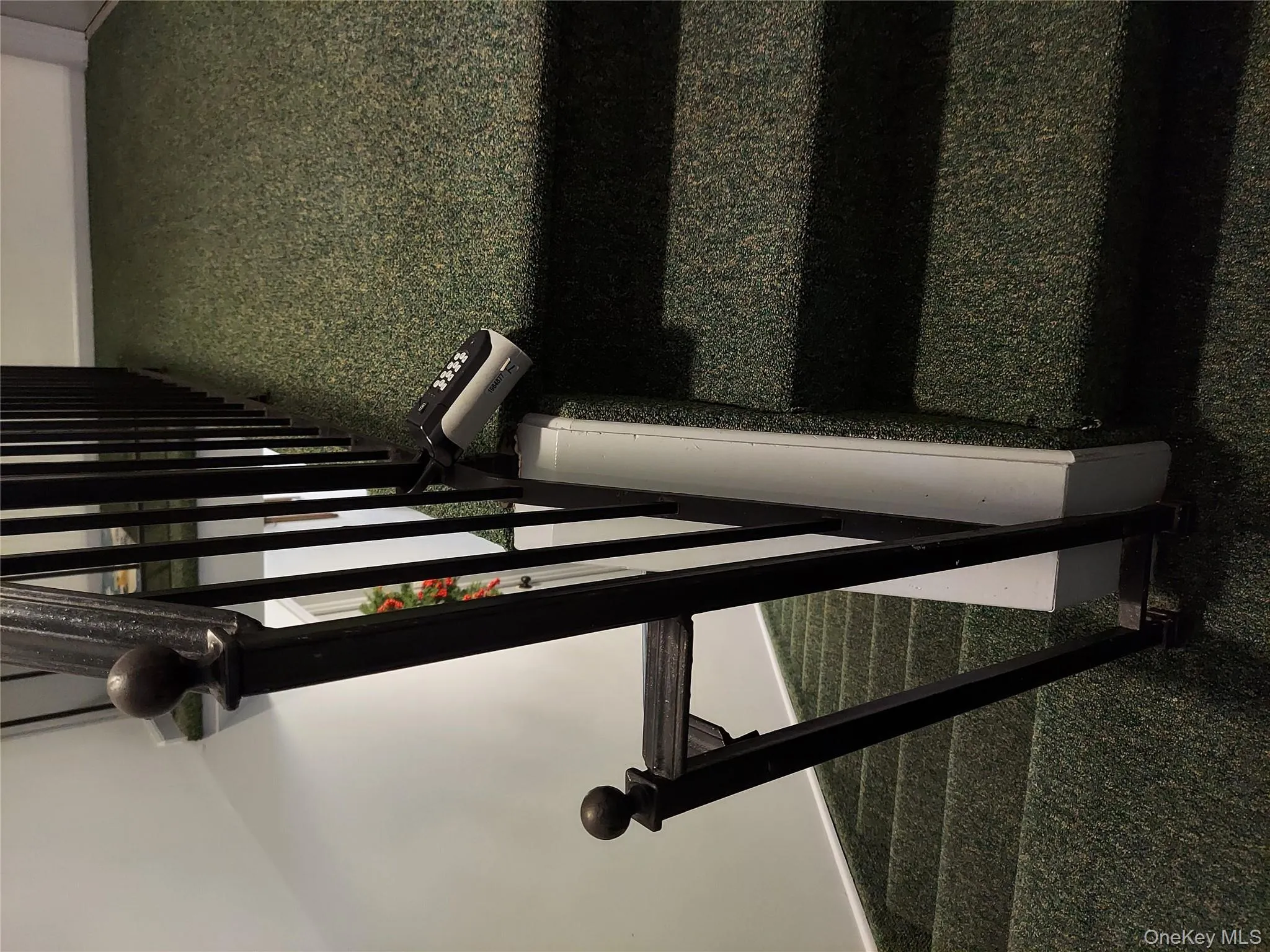 View of stairway. Lockbox on Railing on the 2nd floor. View of stairway. Lockbox on Railing on the 2nd floor.