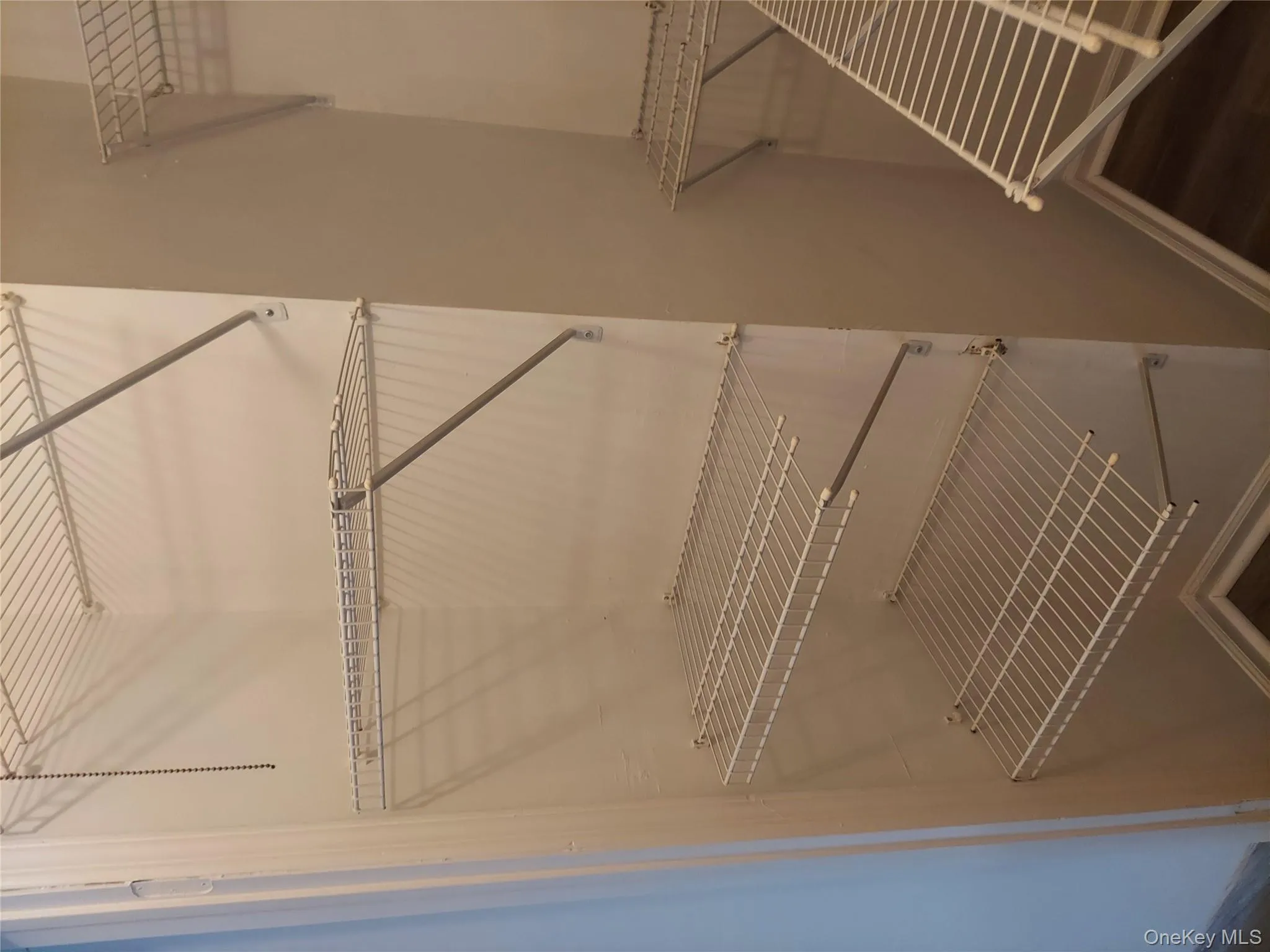 Another view of spacious bedroom closet Another view of spacious bedroom closet