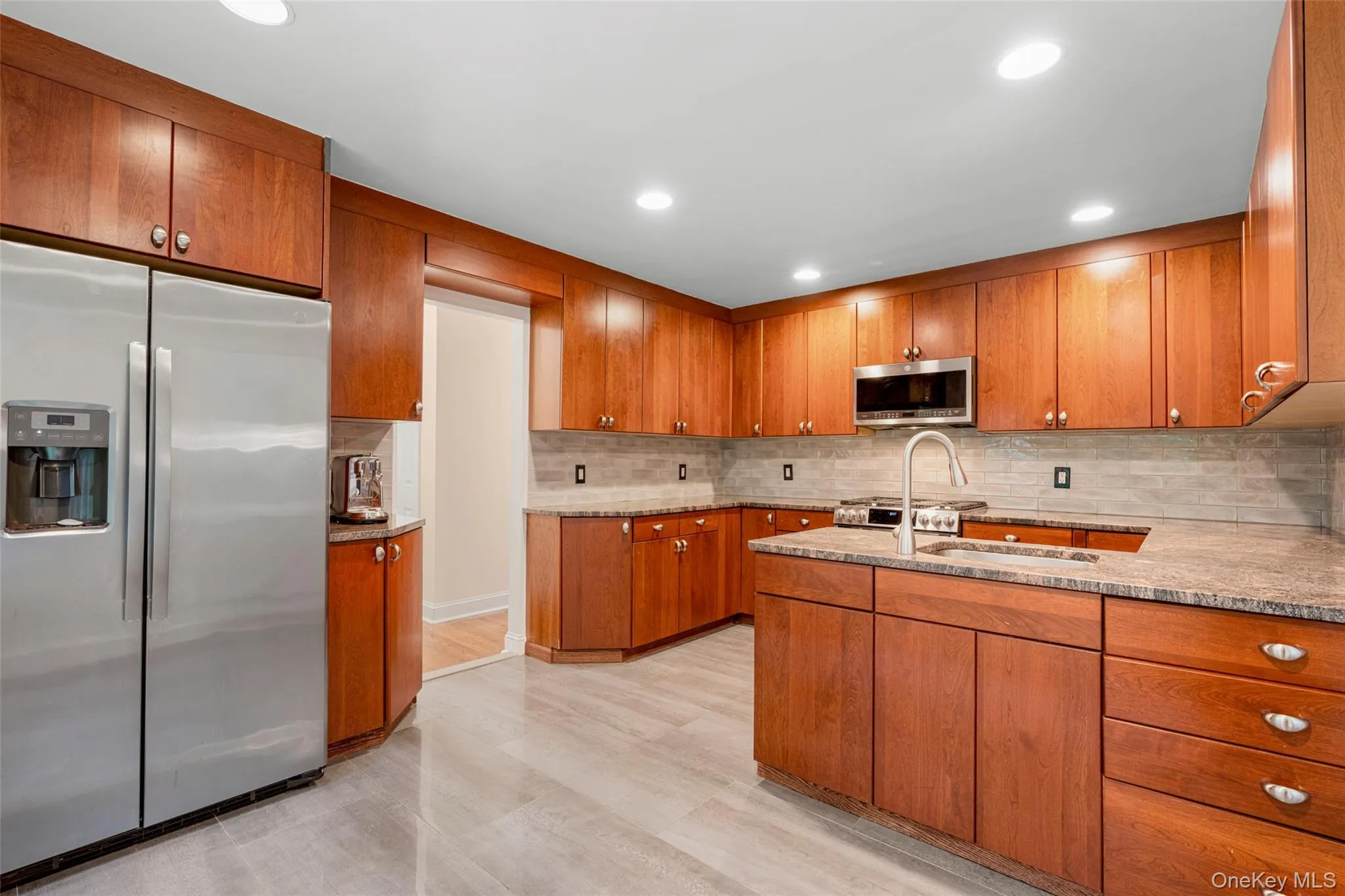 Large updated Kitchen, with ample cabinet space. Large updated Kitchen, with ample cabinet space.