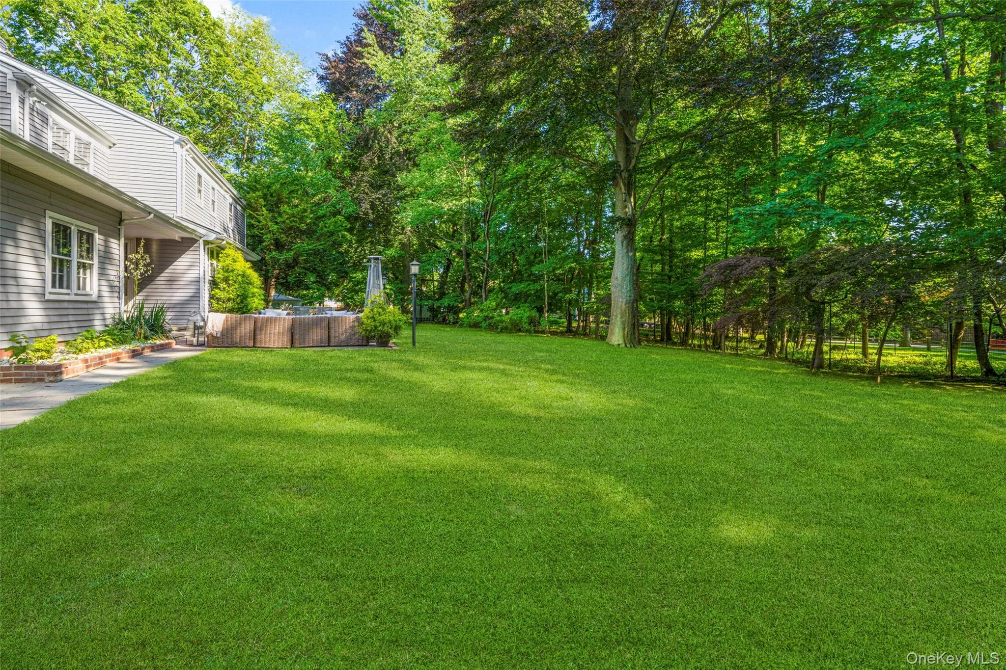 Gorgeous private yard with mature trees. Gorgeous private yard with mature trees.