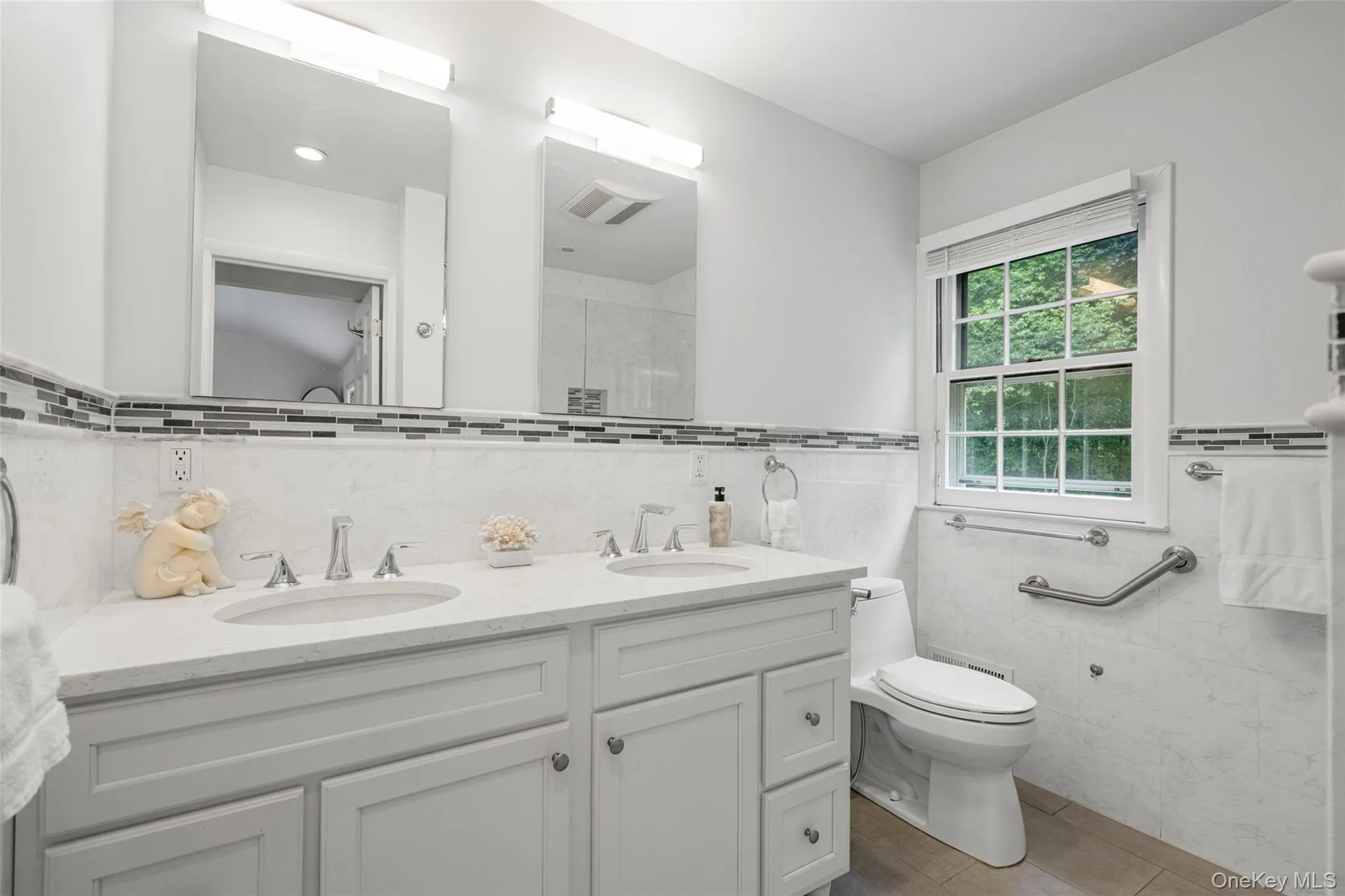 Updated Primary Bath with dual vanity. Updated Primary Bath with dual vanity.