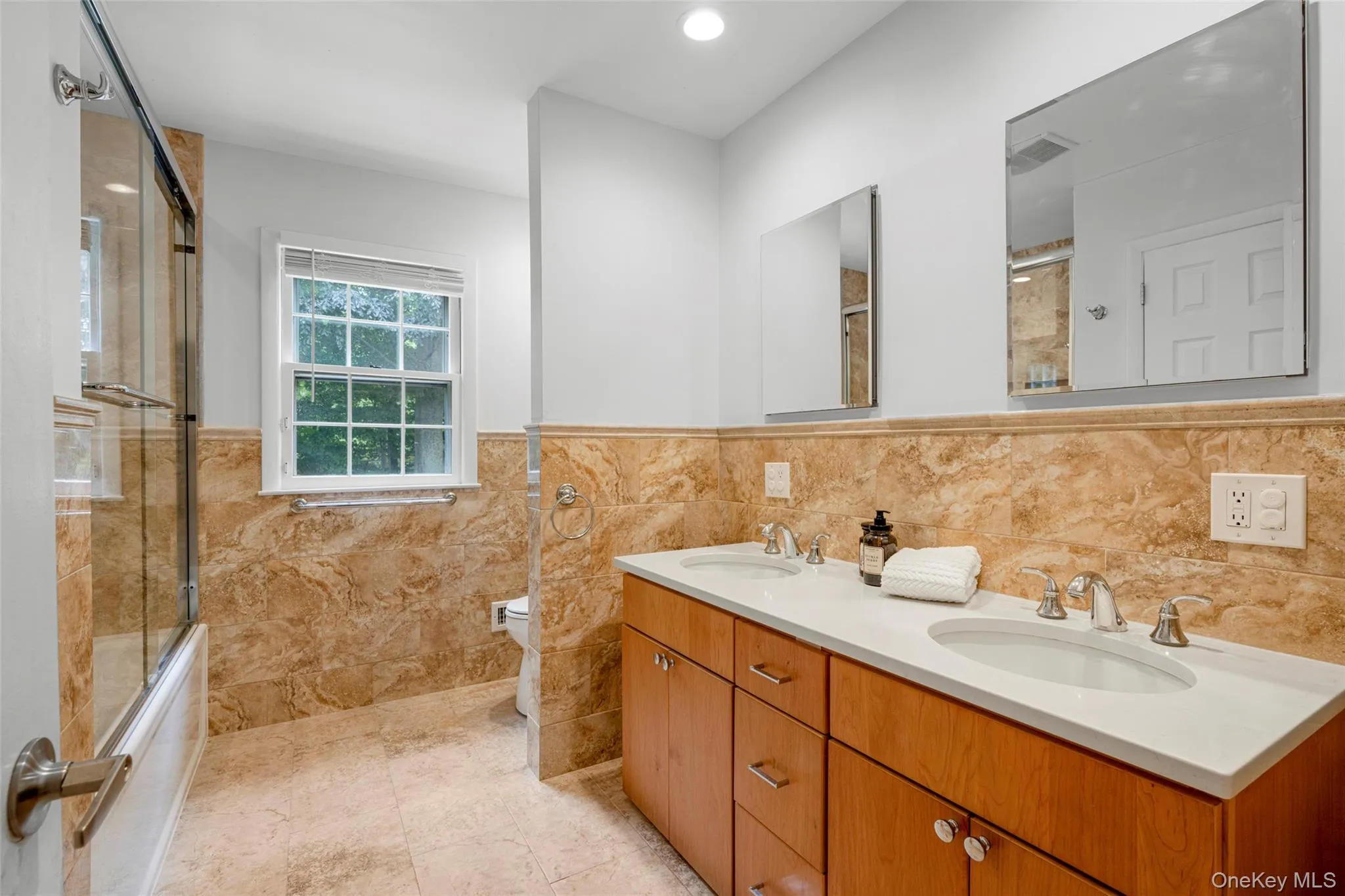 Hallway full bath shared by bedrooms 2, 3 and 4. Hallway full bath shared by bedrooms 2, 3 and 4.