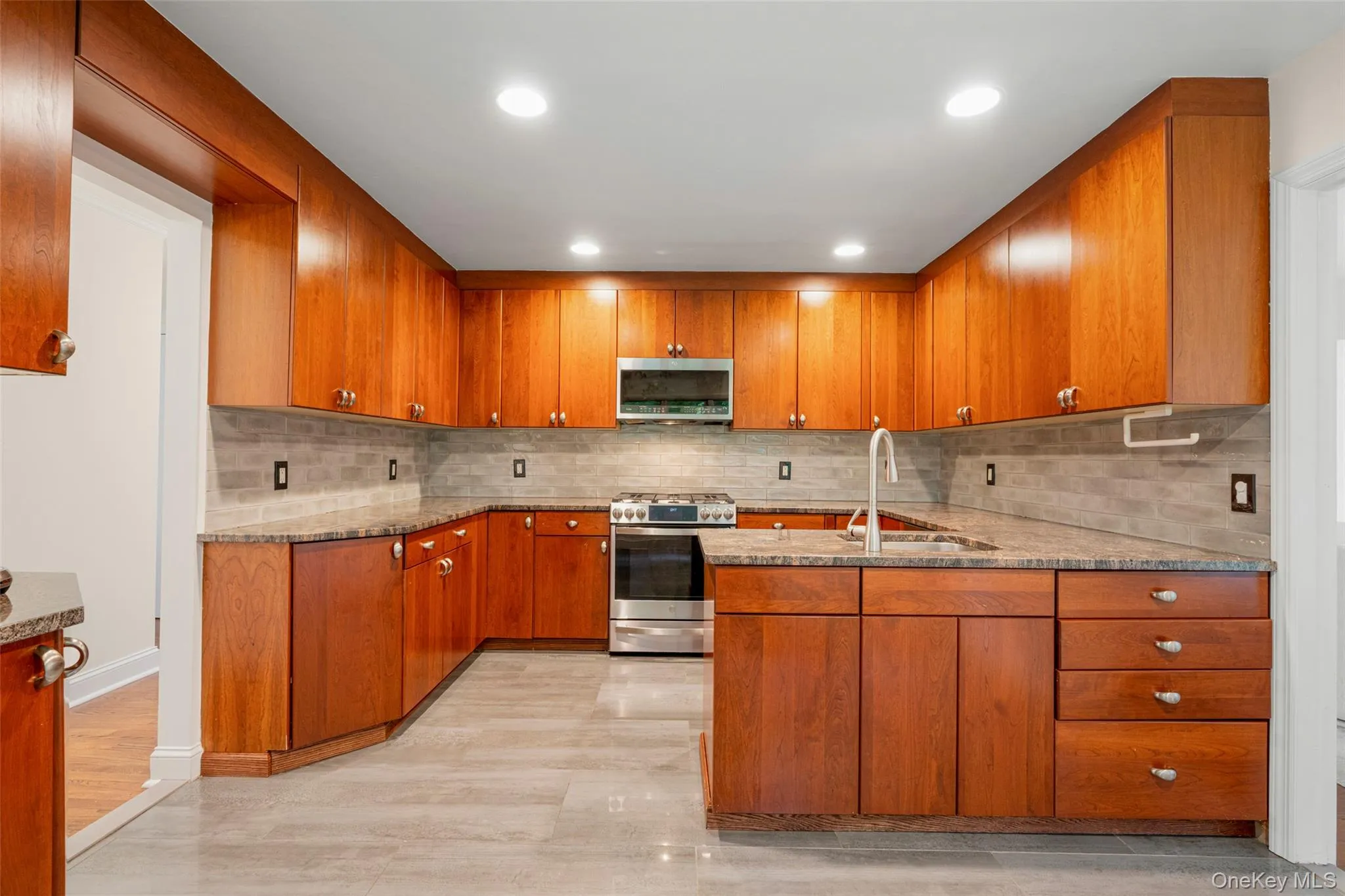 Large updated Kitchen, with ample cabinet space. Large updated Kitchen, with ample cabinet space.