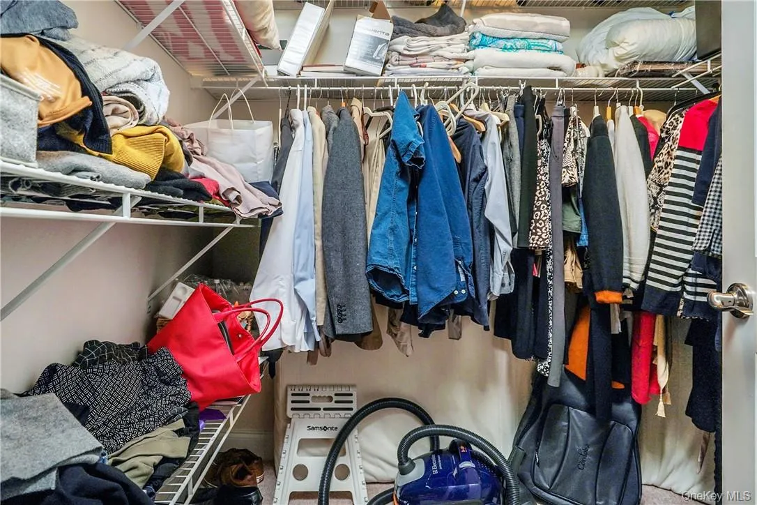 Walk in closet in primary bedroom Walk in closet in primary bedroom