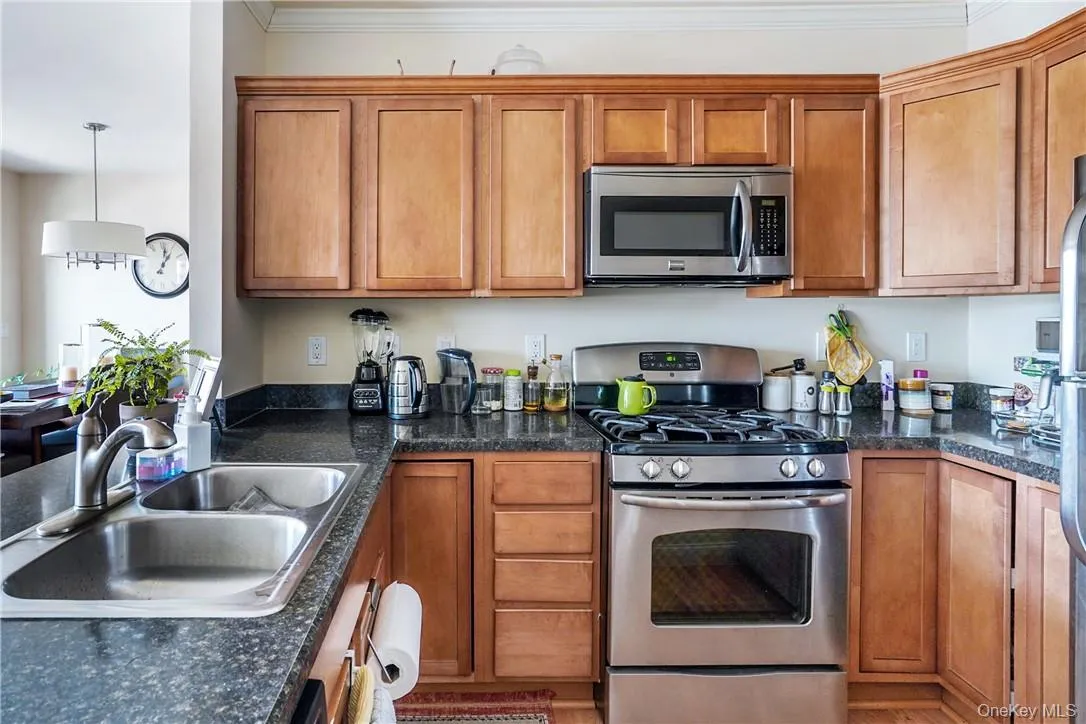 Open kitchen with stainless steel appliances Open kitchen with stainless steel appliances