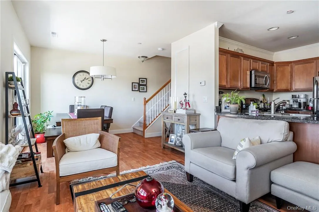 With view of open kitchen and dining area With view of open kitchen and dining area