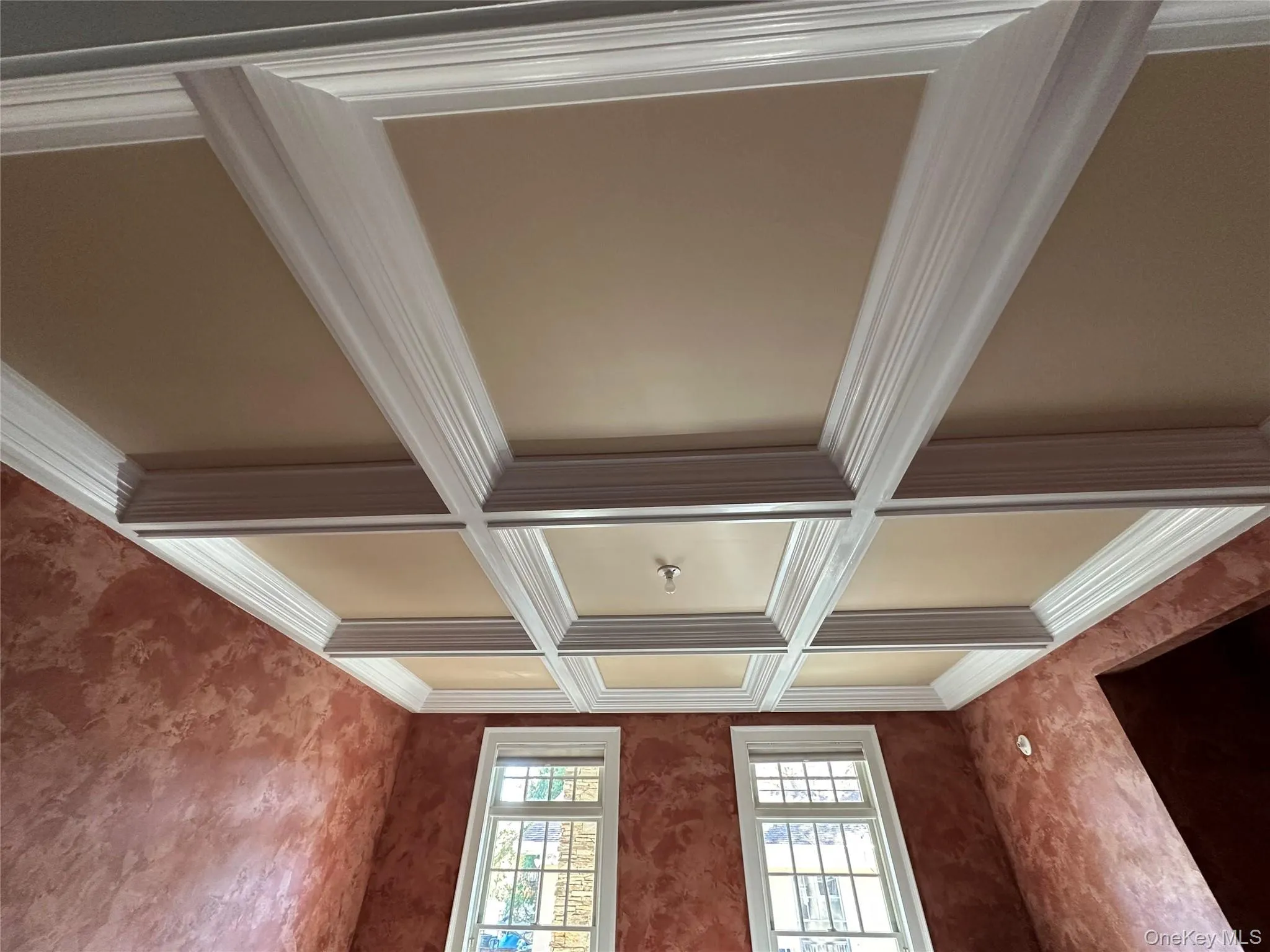 Detailed view of beamed ceiling, ornamental molding, and coffered ceiling Detailed view of beamed ceiling, ornamental molding, and coffered ceiling