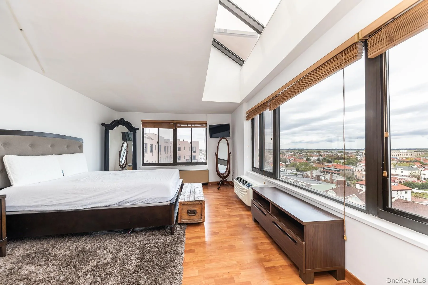 Master bedroom with huge windows overlooking Long Beach Master bedroom with huge windows overlooking Long Beach