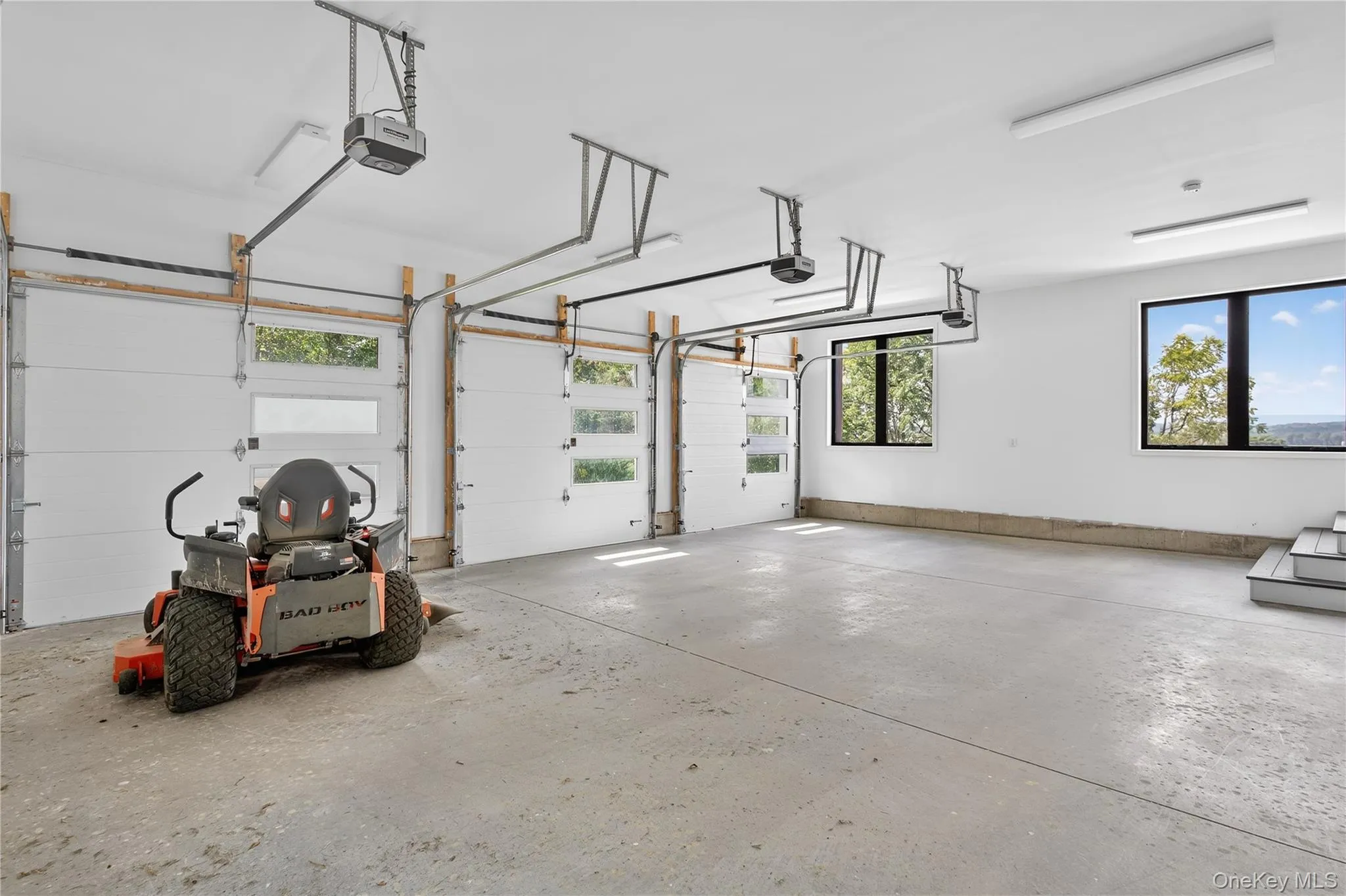 Garage featuring a garage door opener Garage featuring a garage door opener
