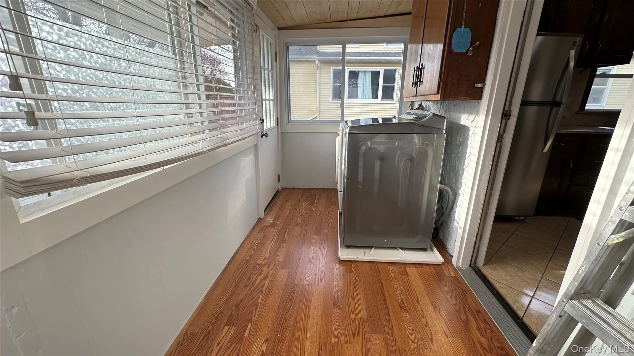 Covered porch , laundry, door out to back entrance Covered porch , laundry, door out to back entrance