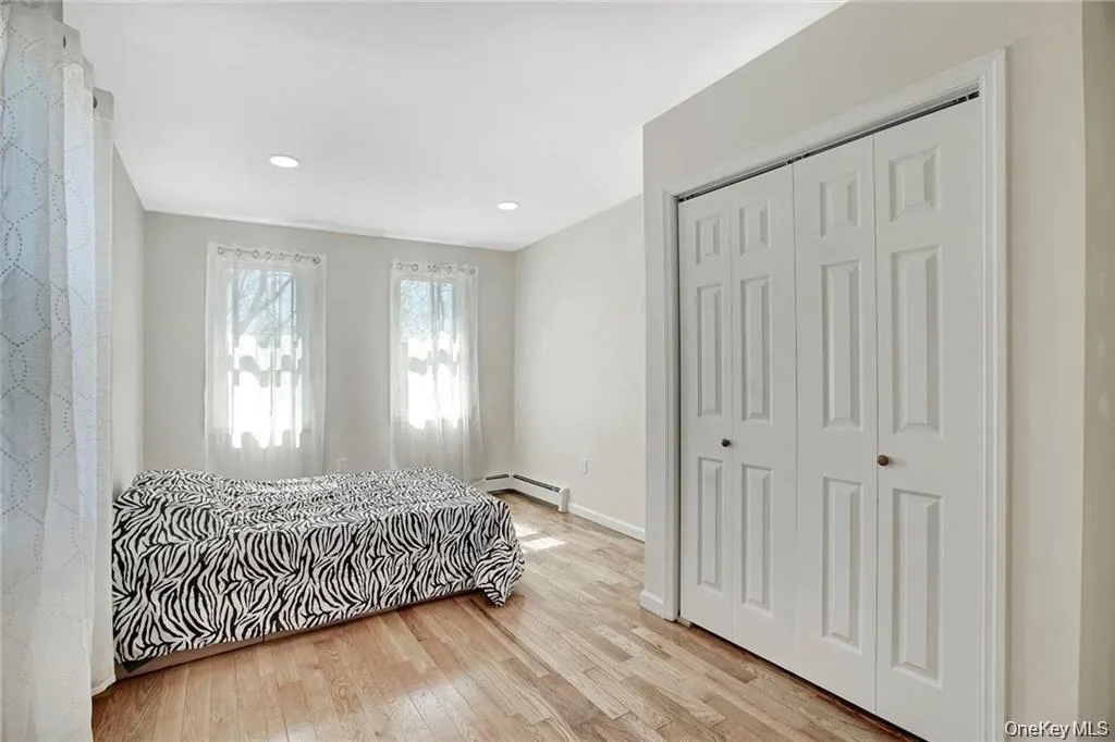 Generously sized bedroom featuring great natural light and ample closet space. Generously sized bedroom featuring great natural light and ample closet space.