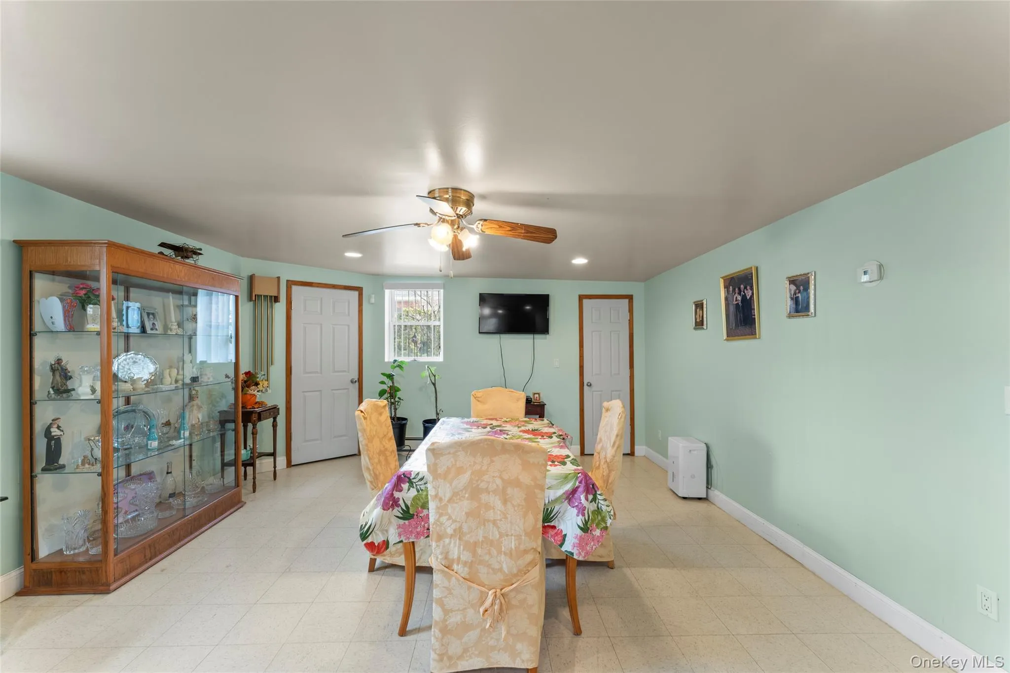 Dining area featuring light flooring, a ceiling fan, and recessed lighting~ Wine Cellar~Ton of Closets and Stoage Dining area featuring light flooring, a ceiling fan, and recessed lighting~ Wine Cellar~Ton of Closets and Stoage