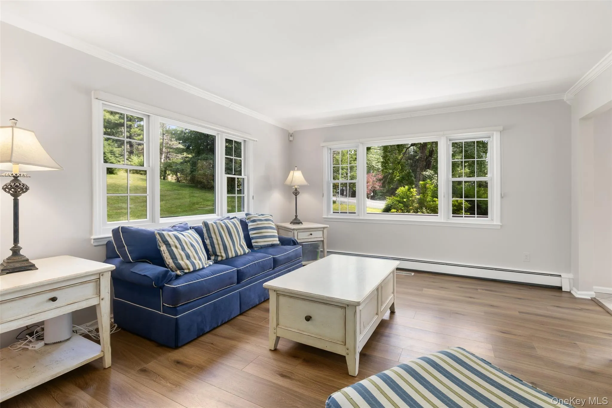 Another view showing two large windows in formal living room Another view showing two large windows in formal living room