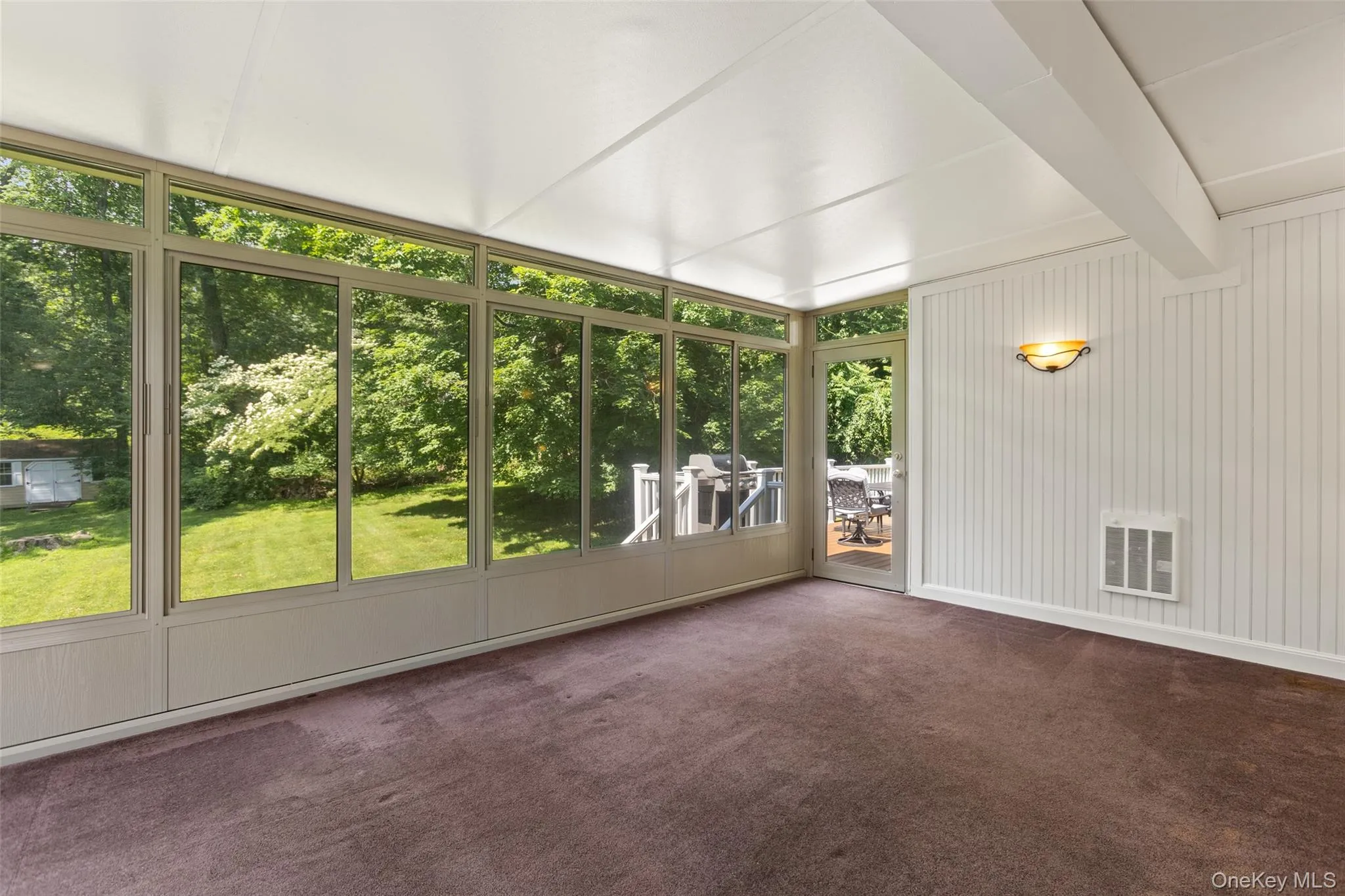 Enclosed screened in heated porch. Enclosed screened in heated porch.