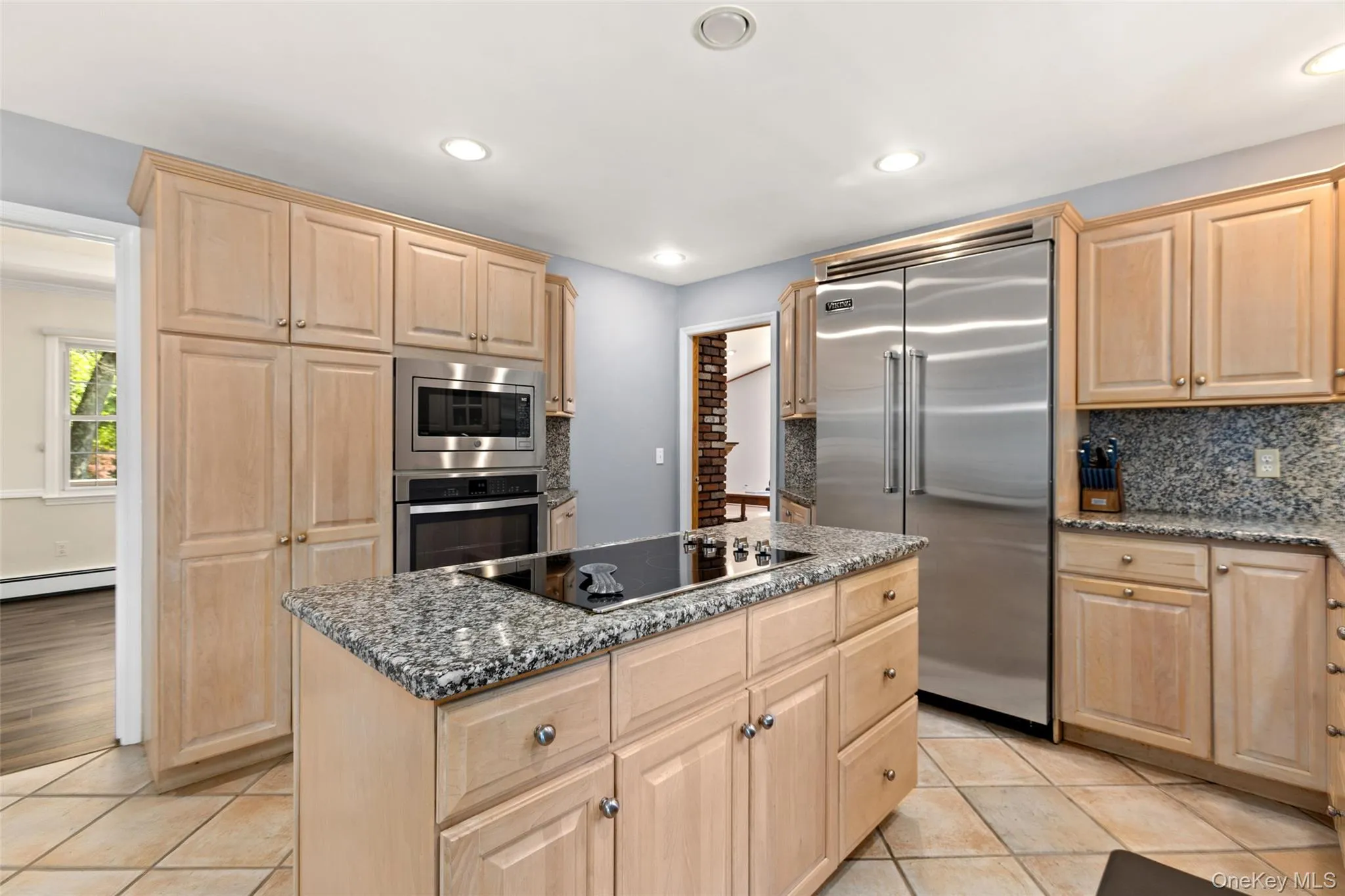 Spacious EIK with center island and stainless steel appliances Spacious EIK with center island and stainless steel appliances
