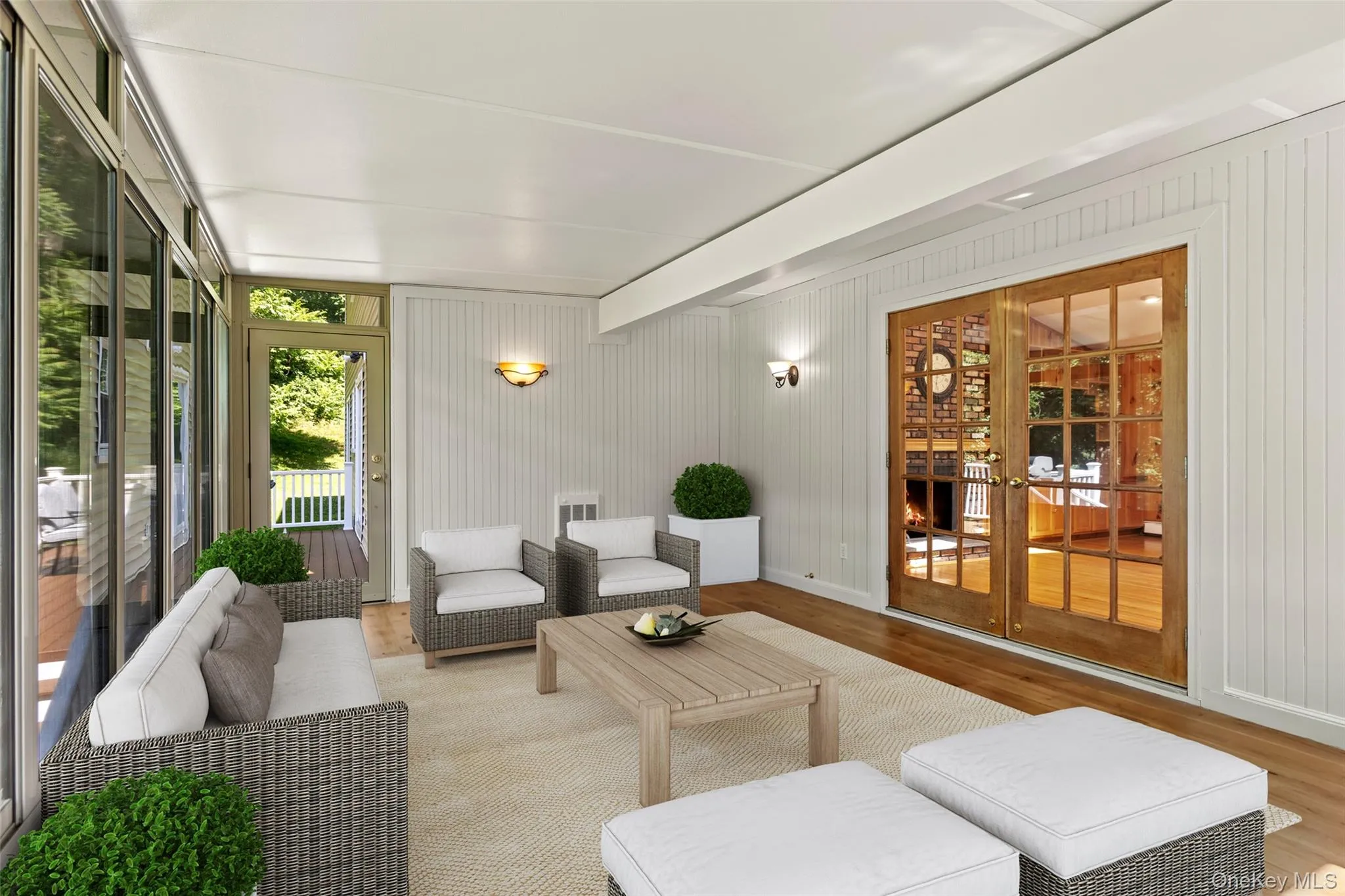 Screened in heated porch virtually staged Screened in heated porch virtually staged