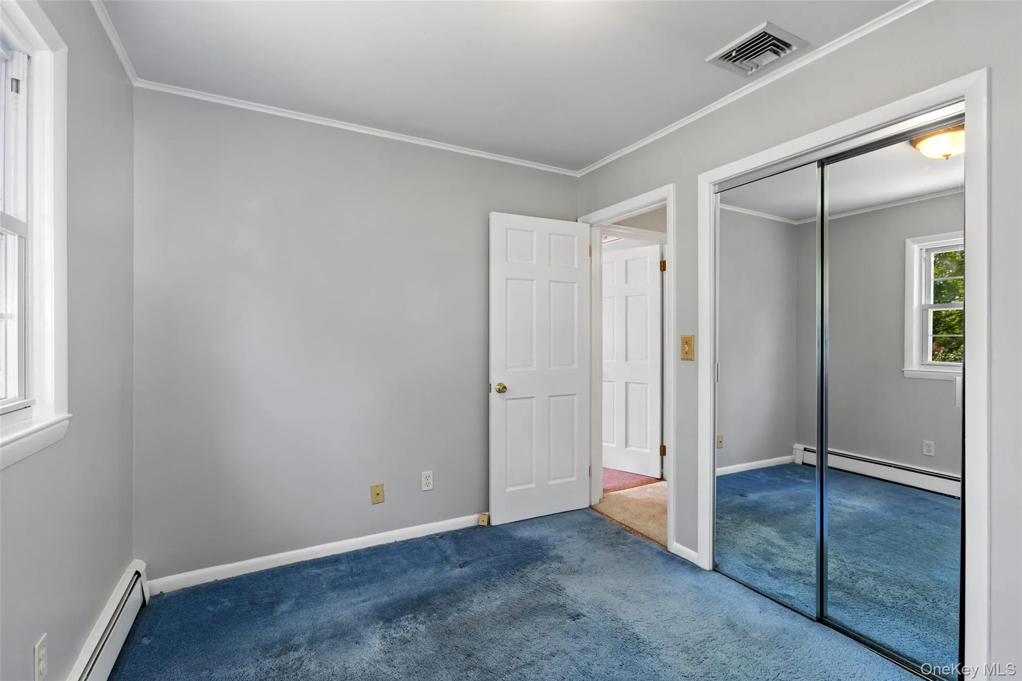 Front bedroom with carpeting and hardwood flooring underneath Front bedroom with carpeting and hardwood flooring underneath