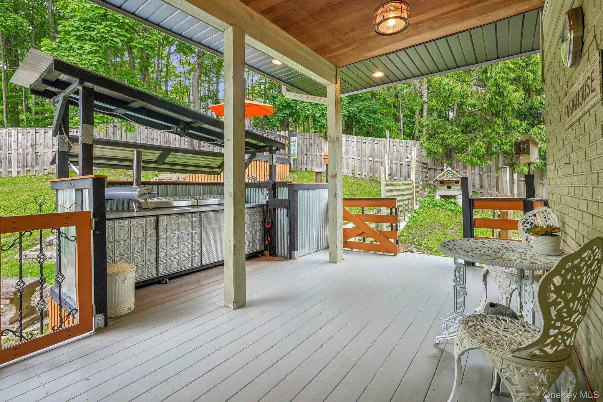 Rear yard deck off the mudroom with pizza oven Rear yard deck off the mudroom with pizza oven