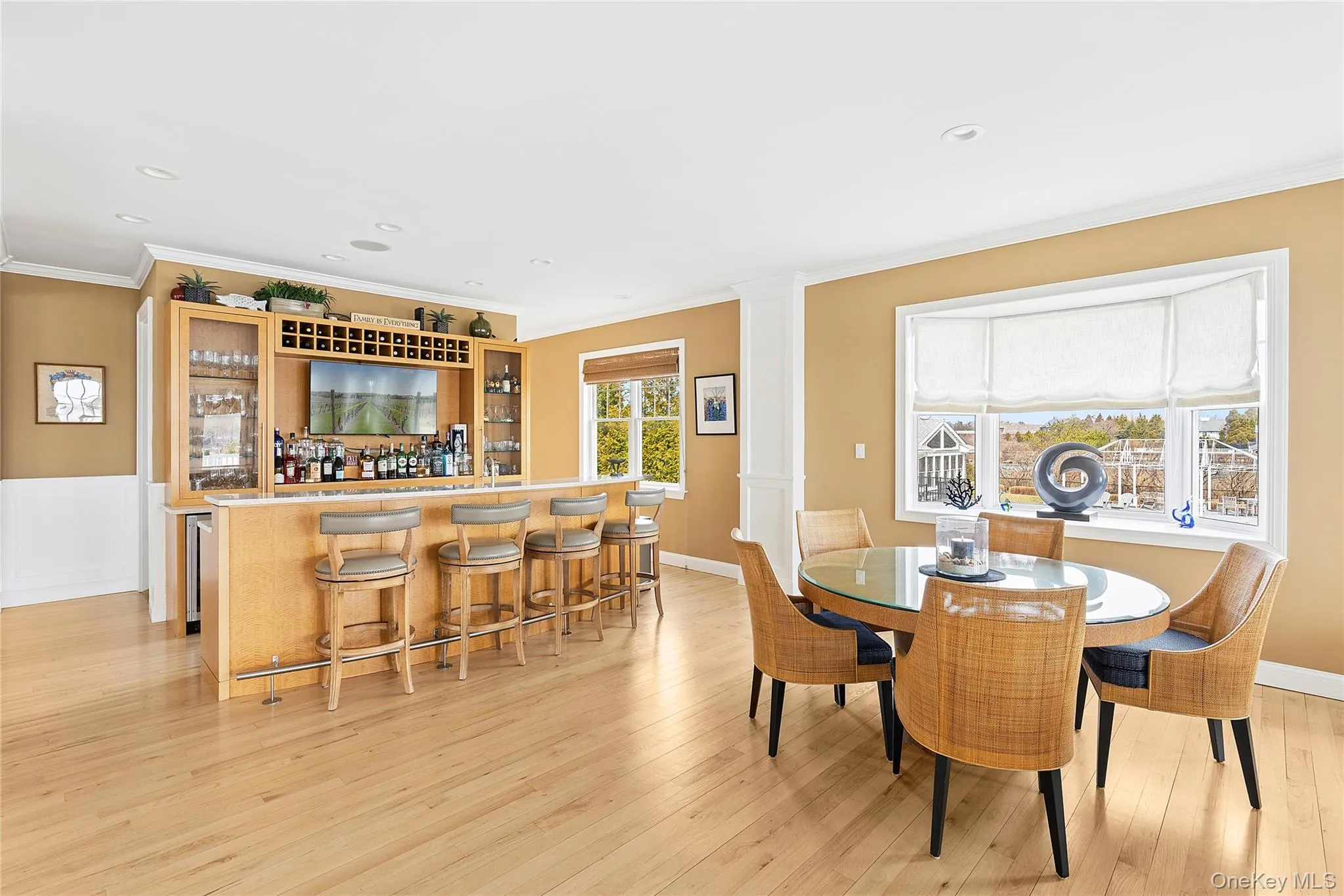 Wet Bar with Seating and Additional Dining Area Wet Bar with Seating and Additional Dining Area