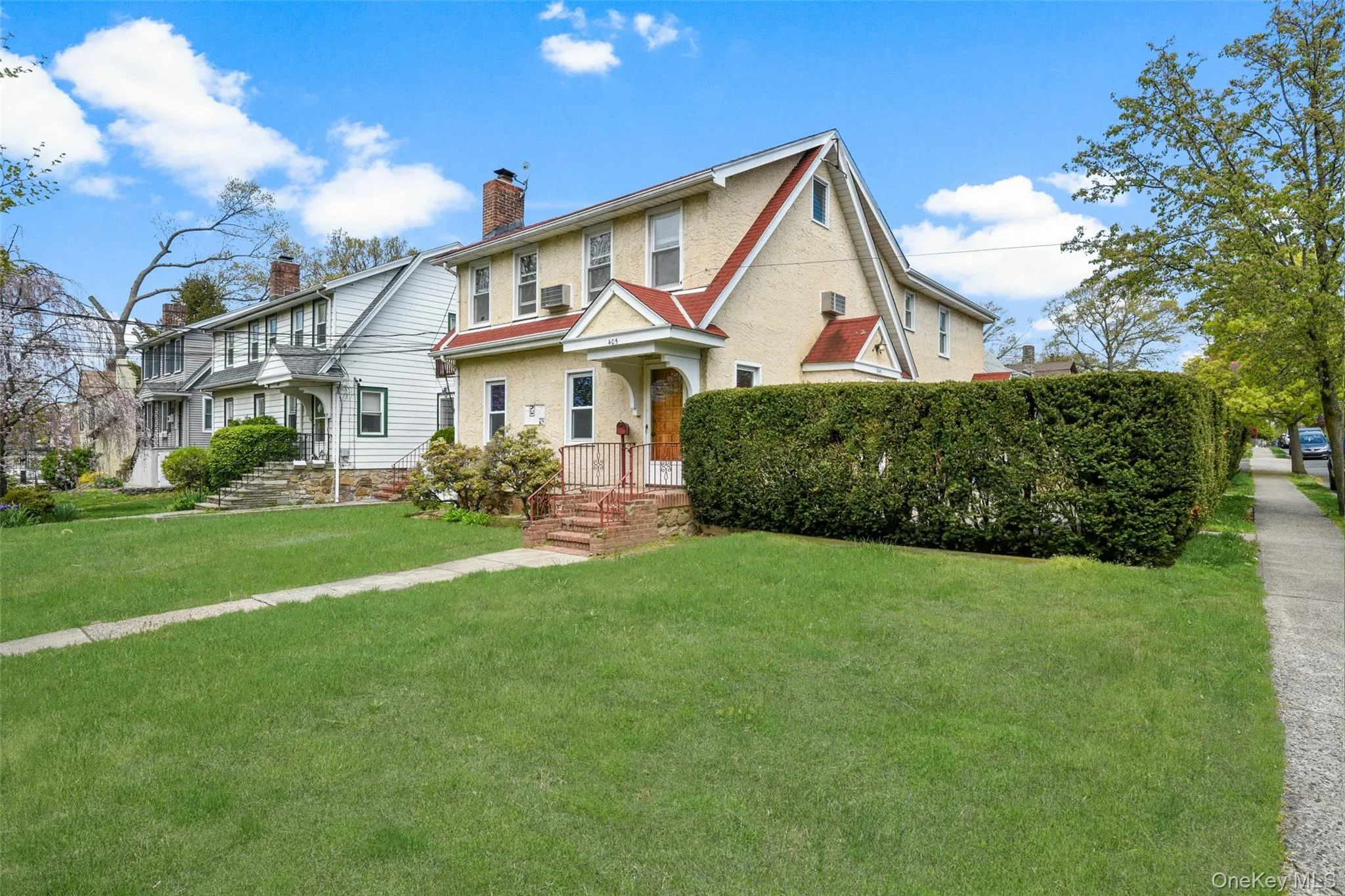 View of entire house. Unit is on the second floor. Private entrance is behind the hedges. View of entire house. Unit is on the second floor. Private entrance is behind the hedges.