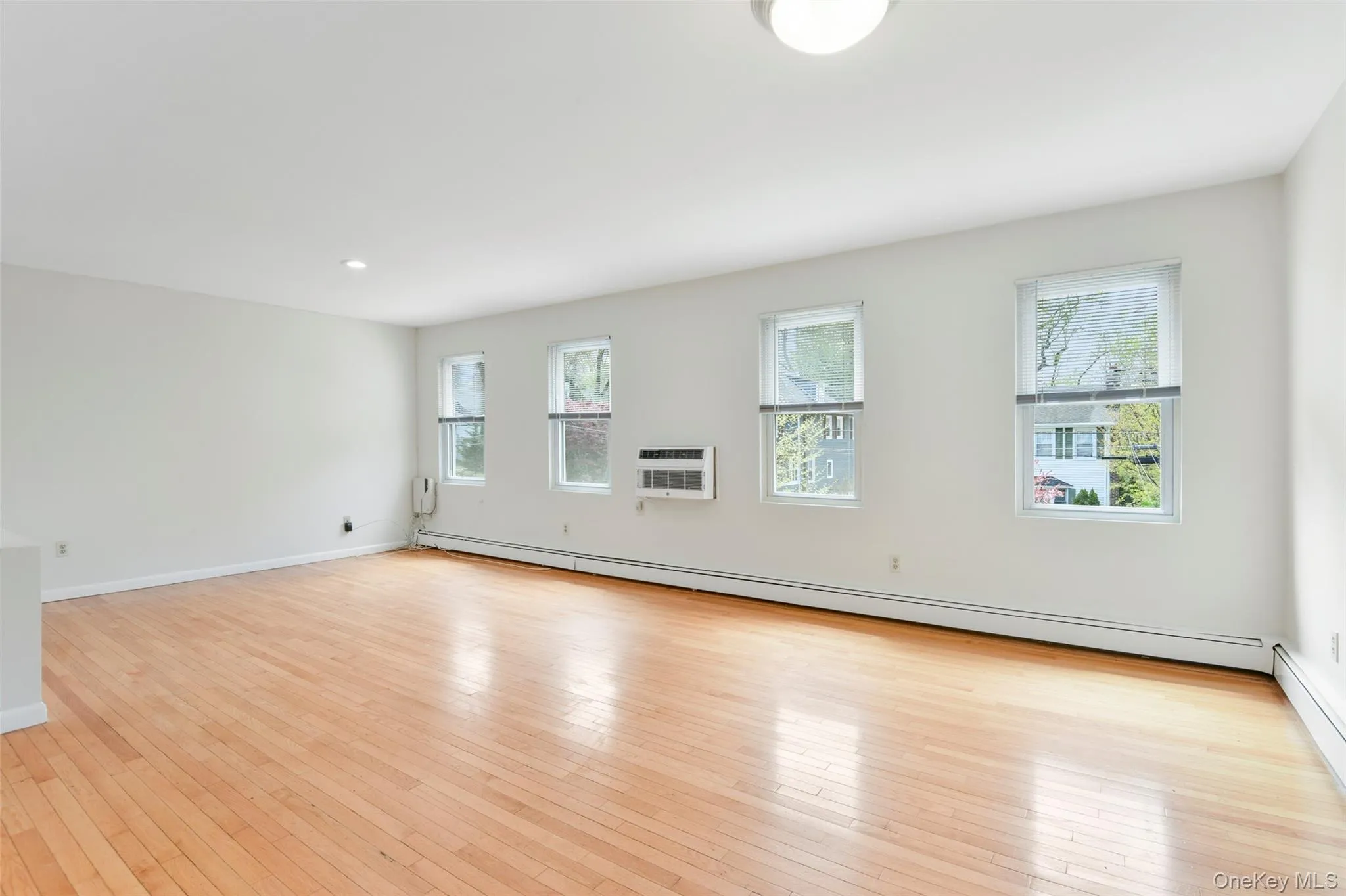 Hardwood floors and bright space. Hardwood floors and bright space.