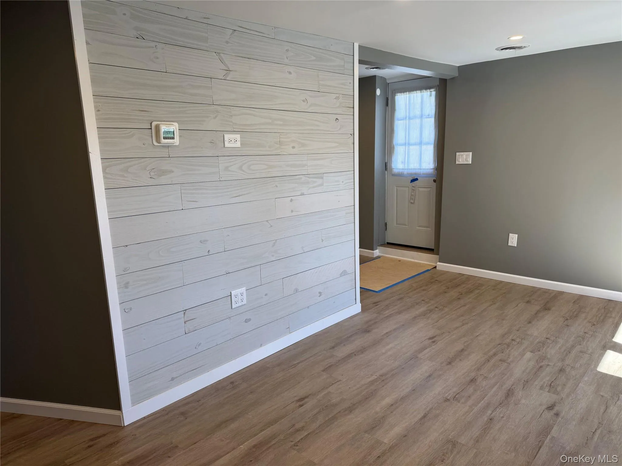 Shiplap wall & New flooring Shiplap wall & New flooring