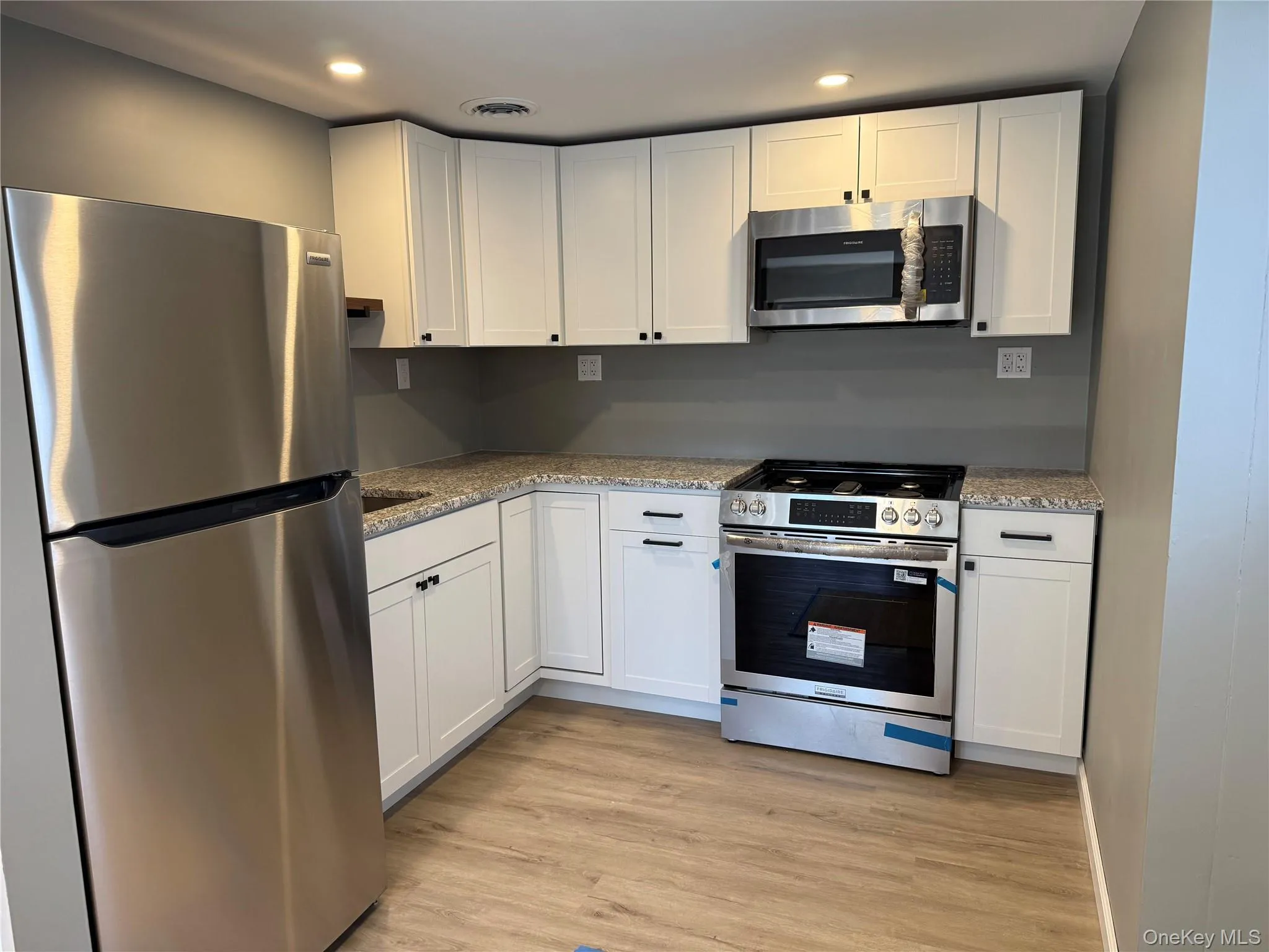 Beautiful renovated kitchen w/granite counter tops & SS appliances Beautiful renovated kitchen w/granite counter tops & SS appliances