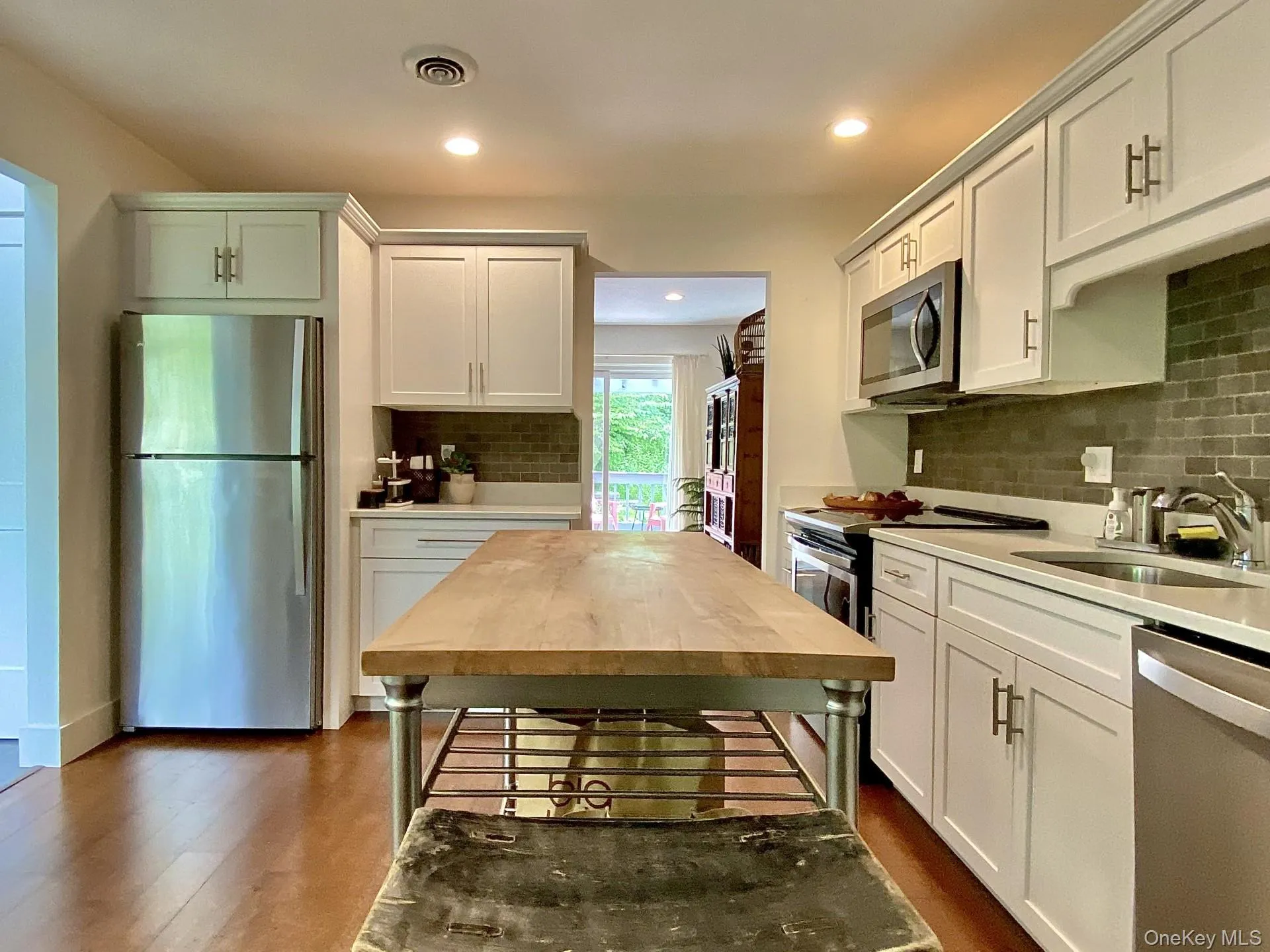 Island and stainless appliances Island and stainless appliances